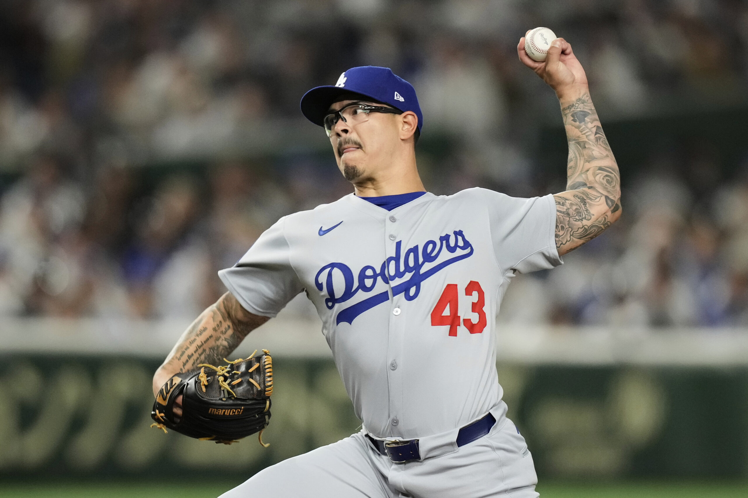 Los Angeles Dodgers relief pitcher Anthony Banda throws to the...