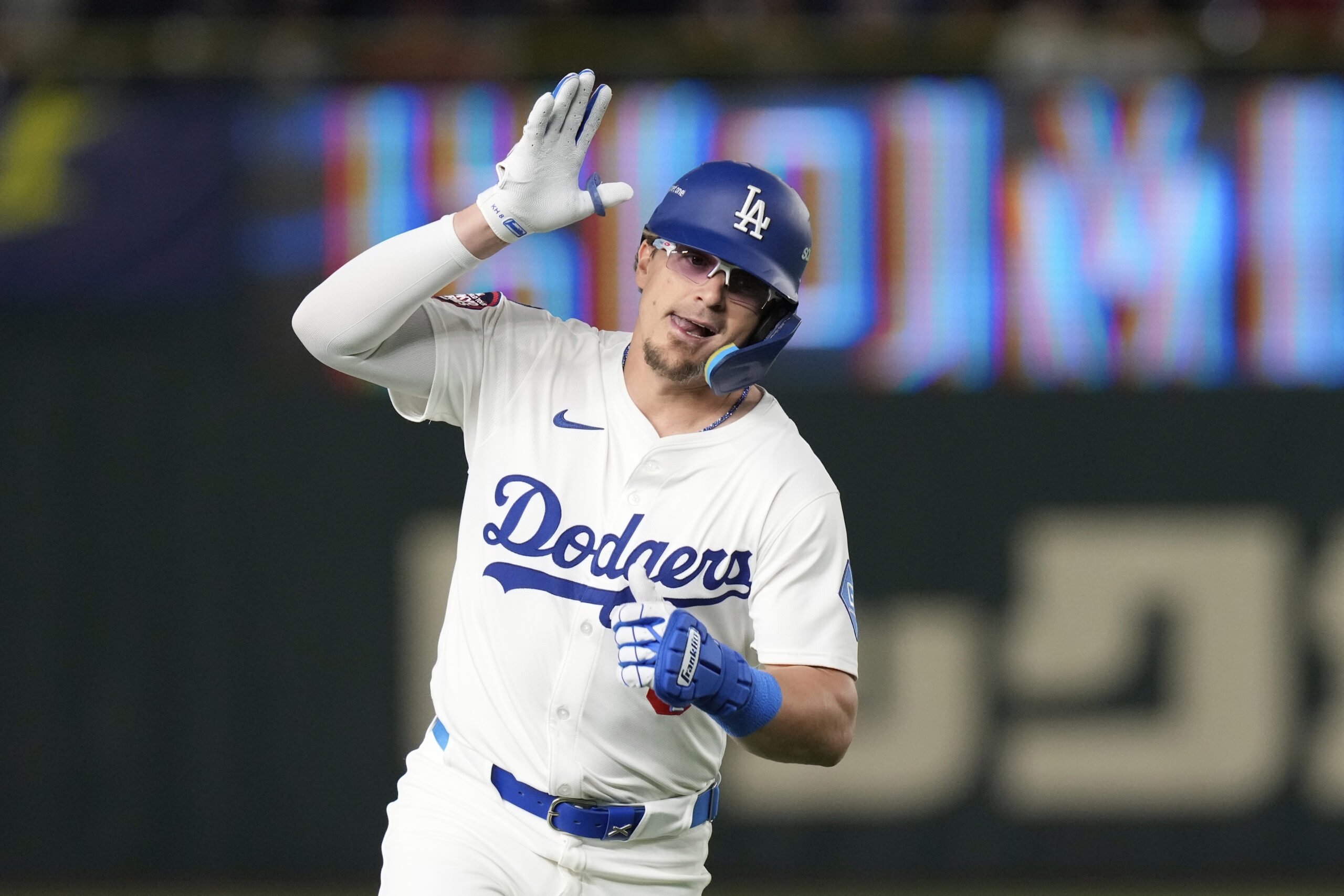 The Dodgers’ Kiké Hernandez celebrates as he rounds the bases...