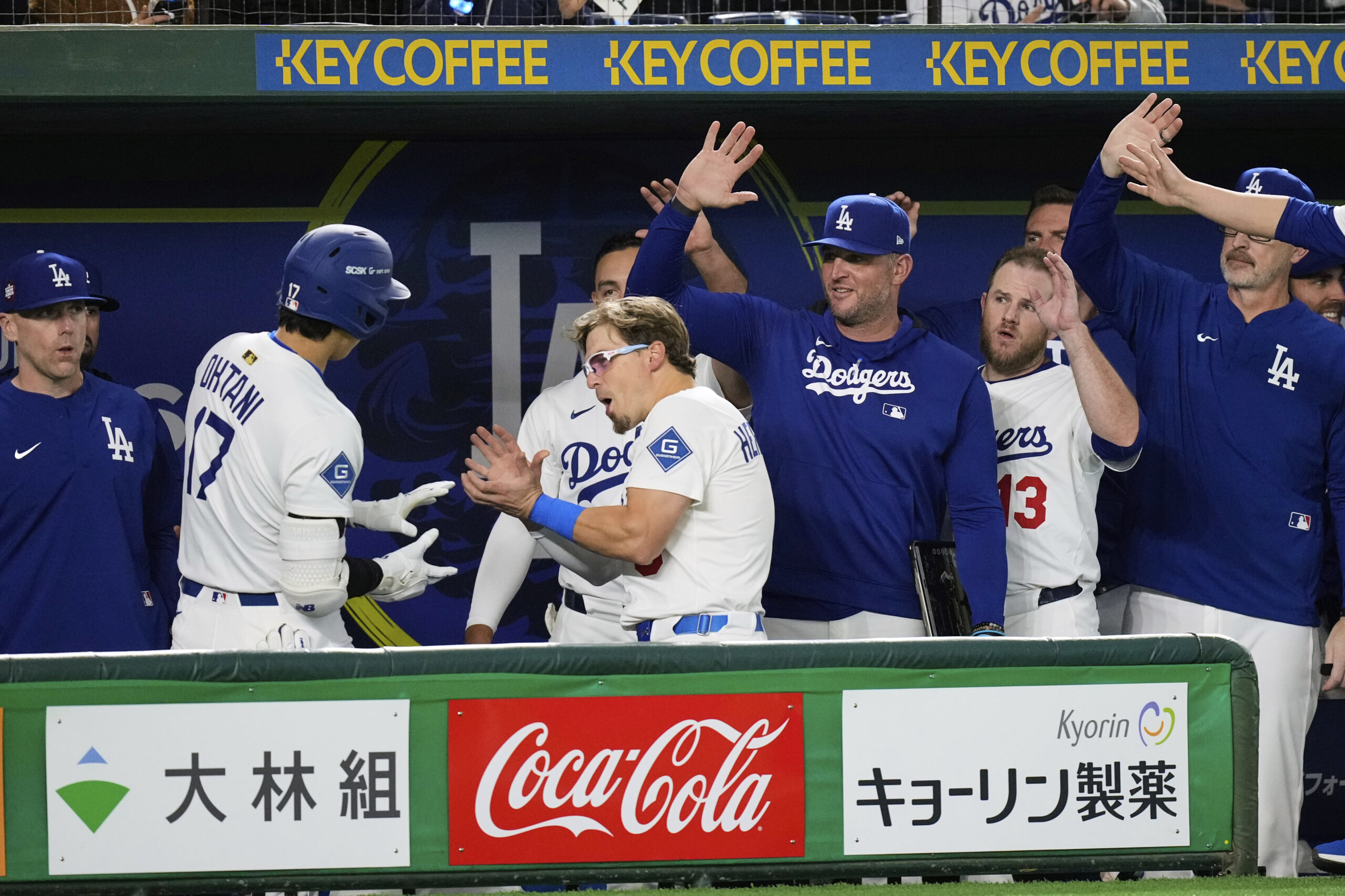 The Dodgers’ Shohei Ohtani (17) celebrates with the team in...