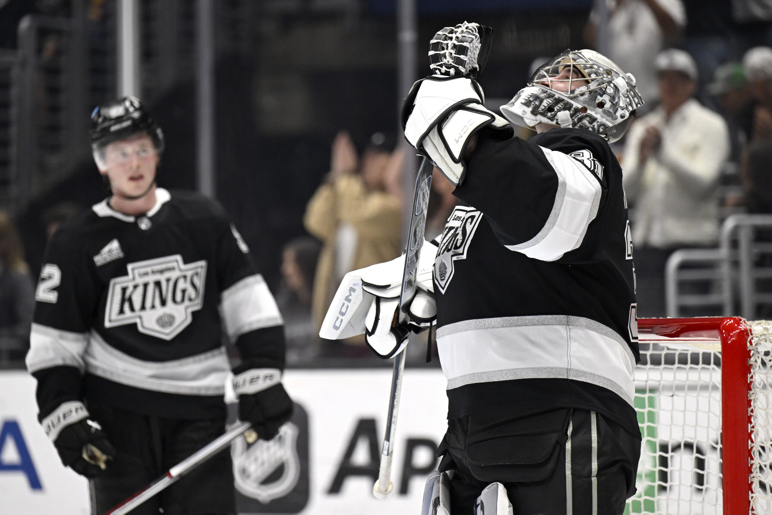 Kings goaltender David Rittich, right, reacts after his team defeated...