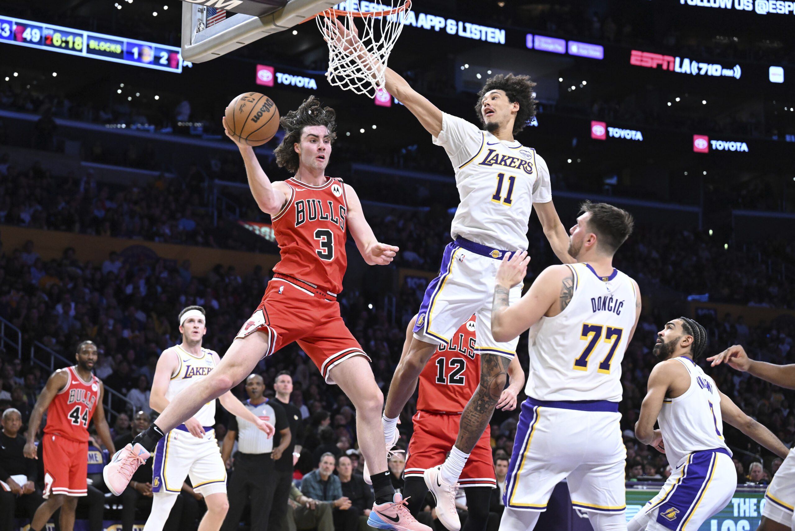 Chicago Bulls guard Josh Giddey (3) passes the ball in...