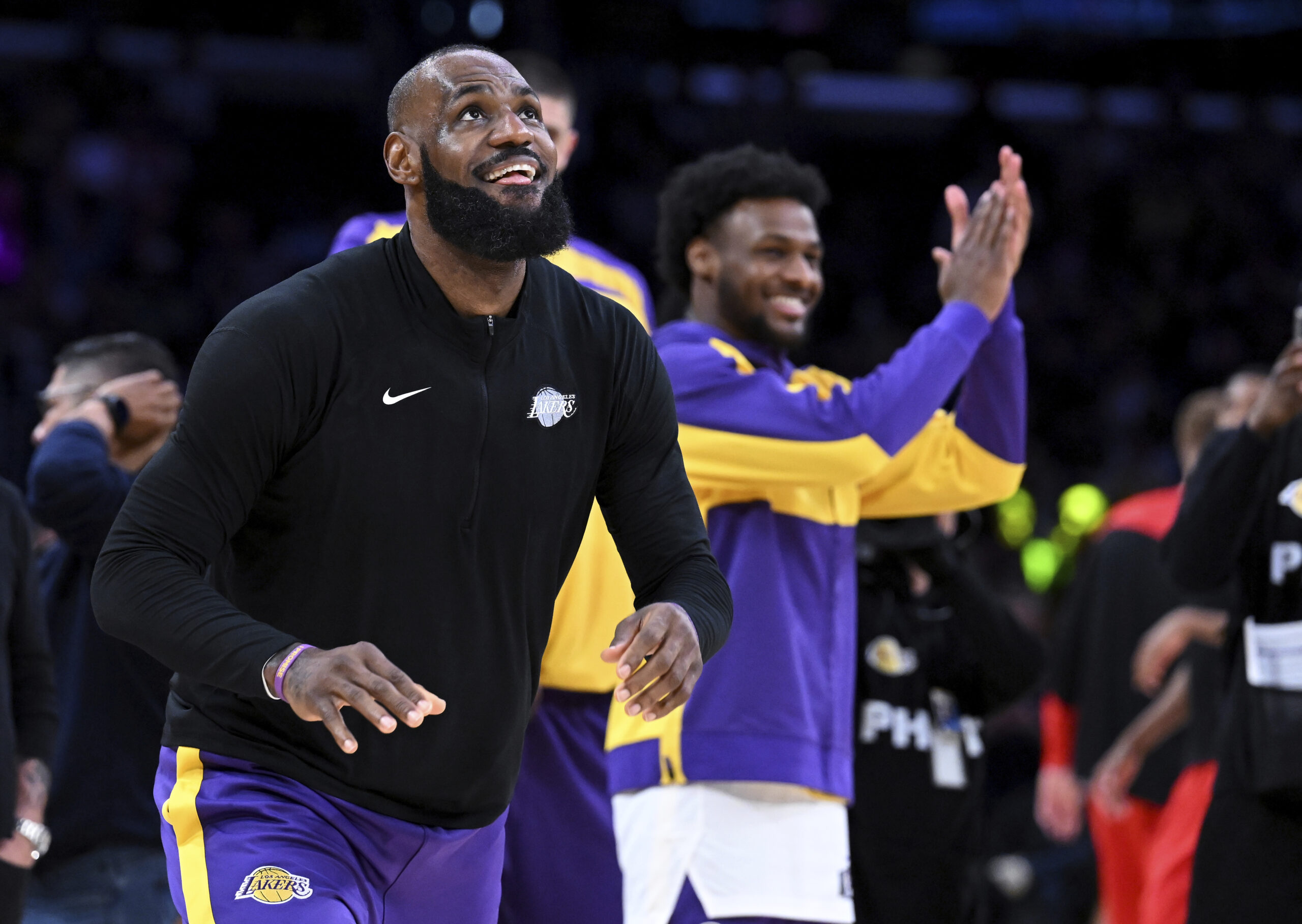 Lakers forward LeBron James, left, and son Los Angeles Lakers...