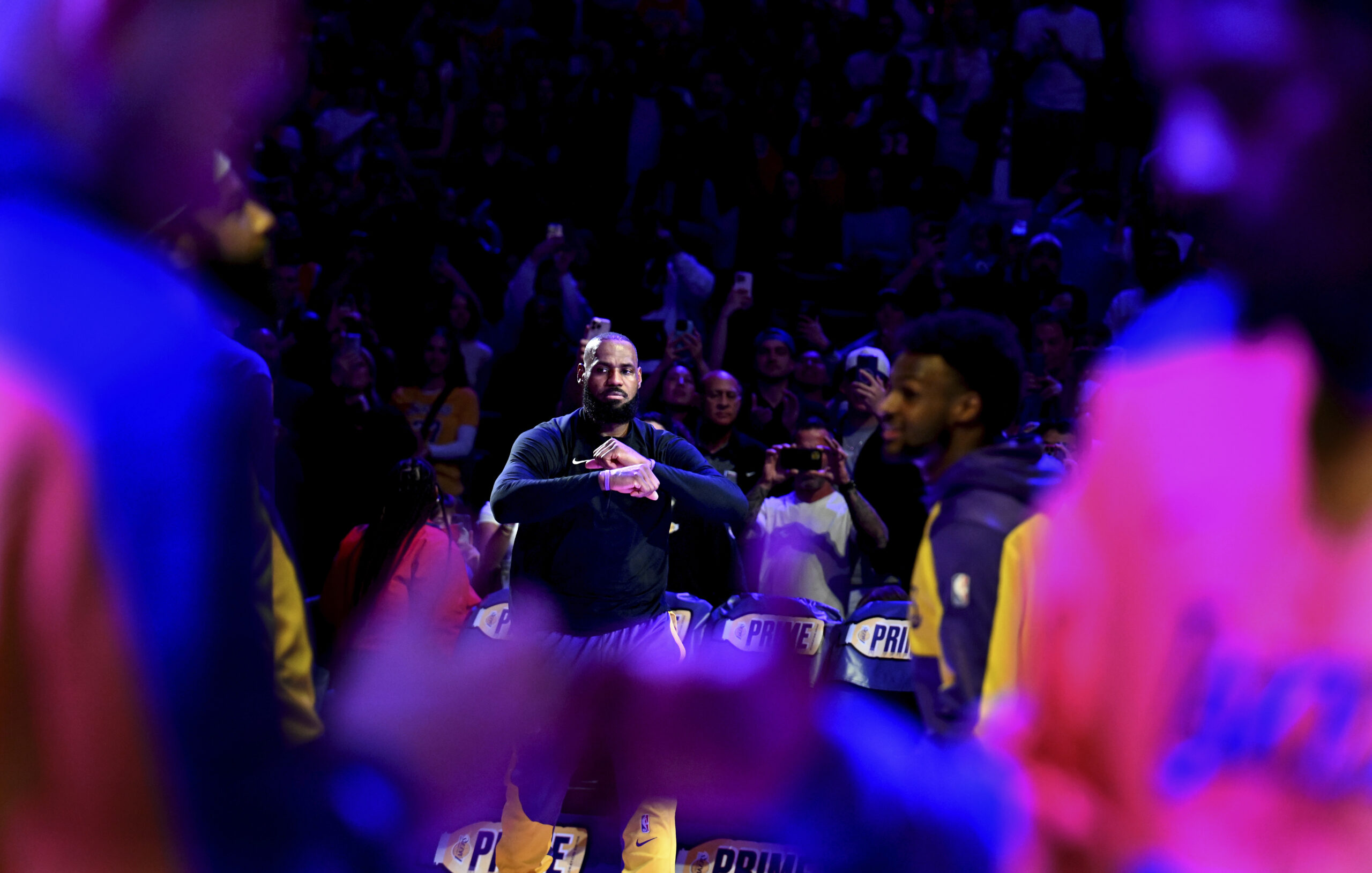 Lakers forward LeBron James is introduced before an NBA basketball...