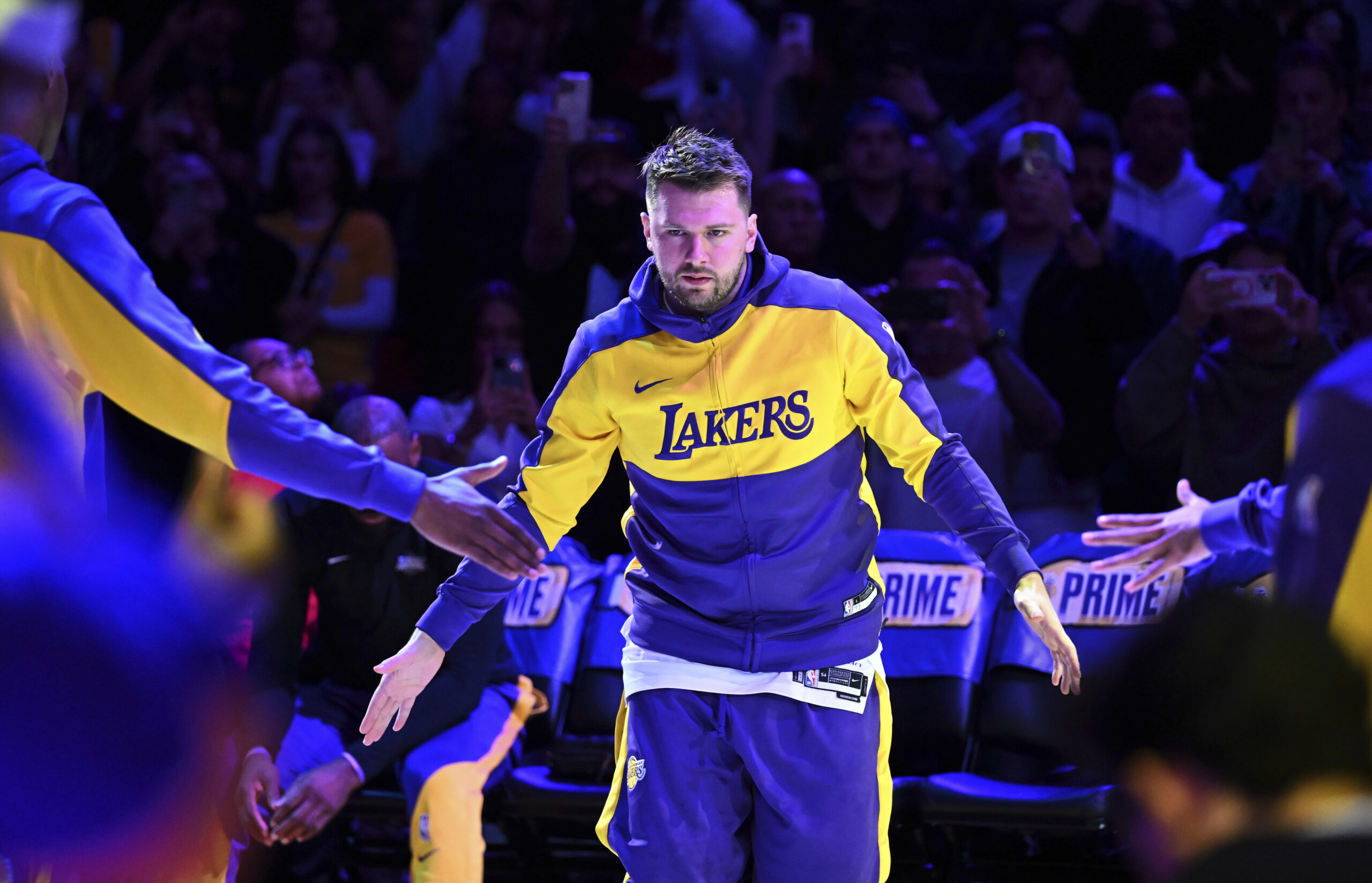 Lakers guard Luka Doncic is introduced before an NBA basketball...