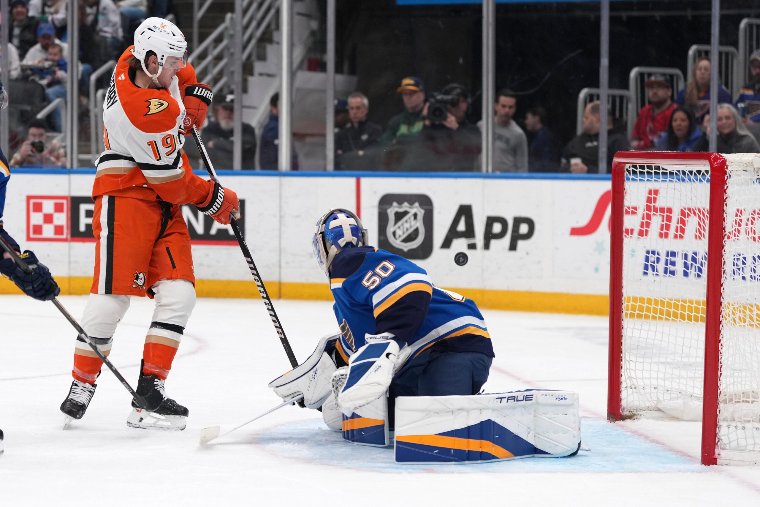 Ducks’ Troy Terry (19) deflects a puck wide of St....