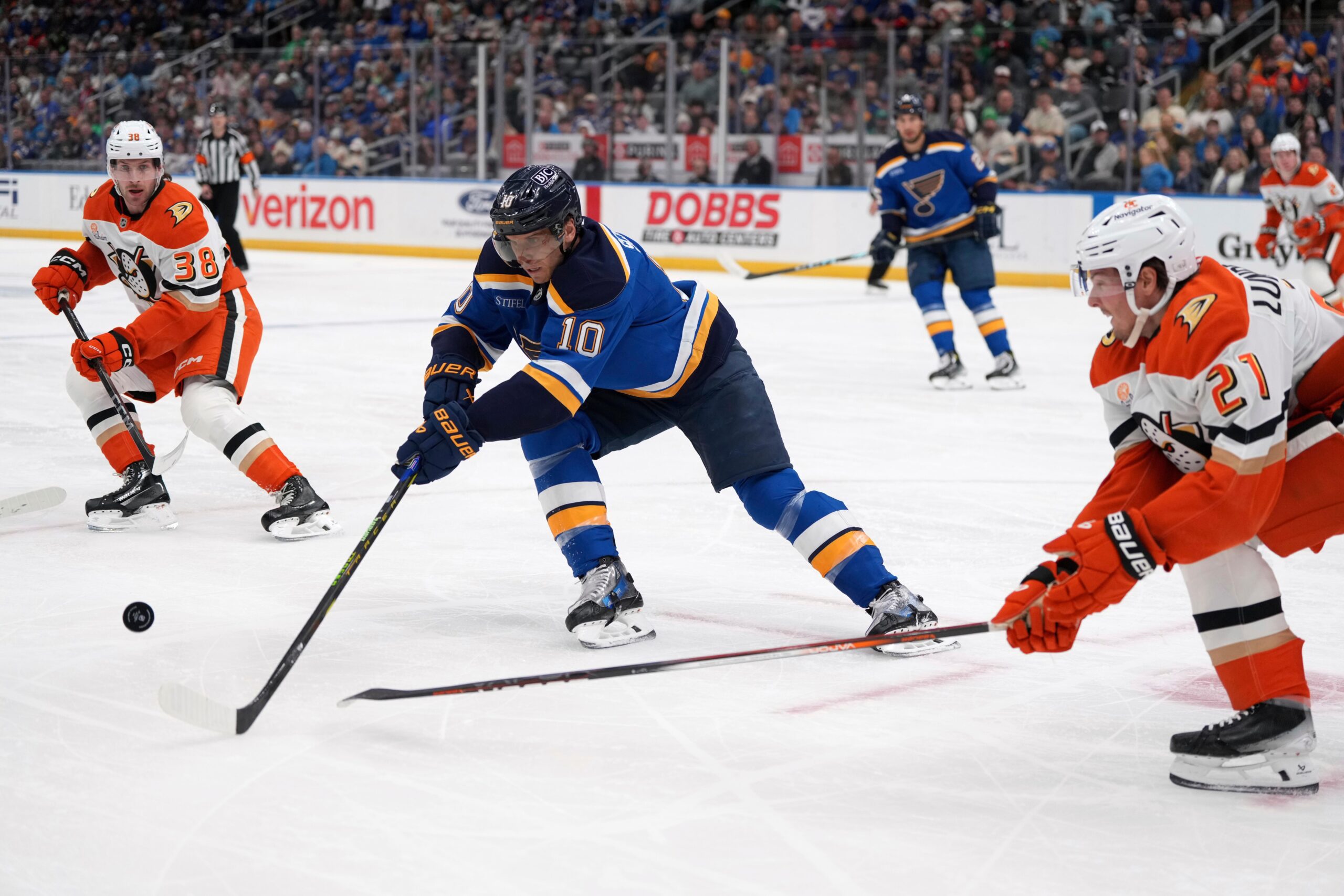 St. Louis Blues’ Brayden Schenn (10) reaches for a loose...