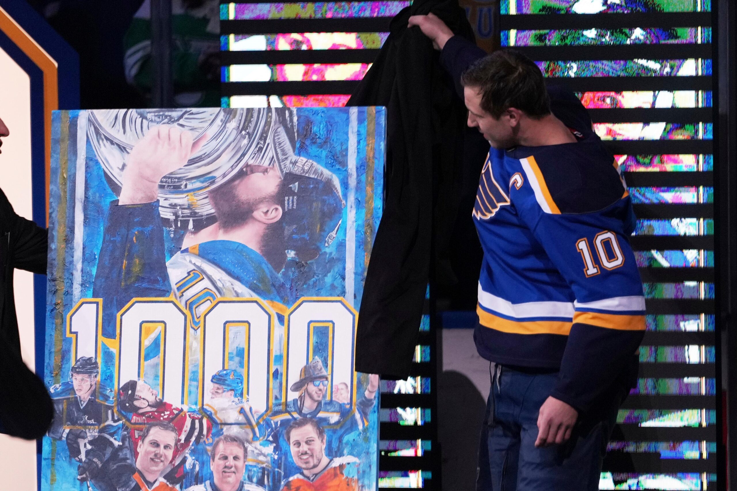 St. Louis Blues’ Brayden Schenn is honored for playing in...