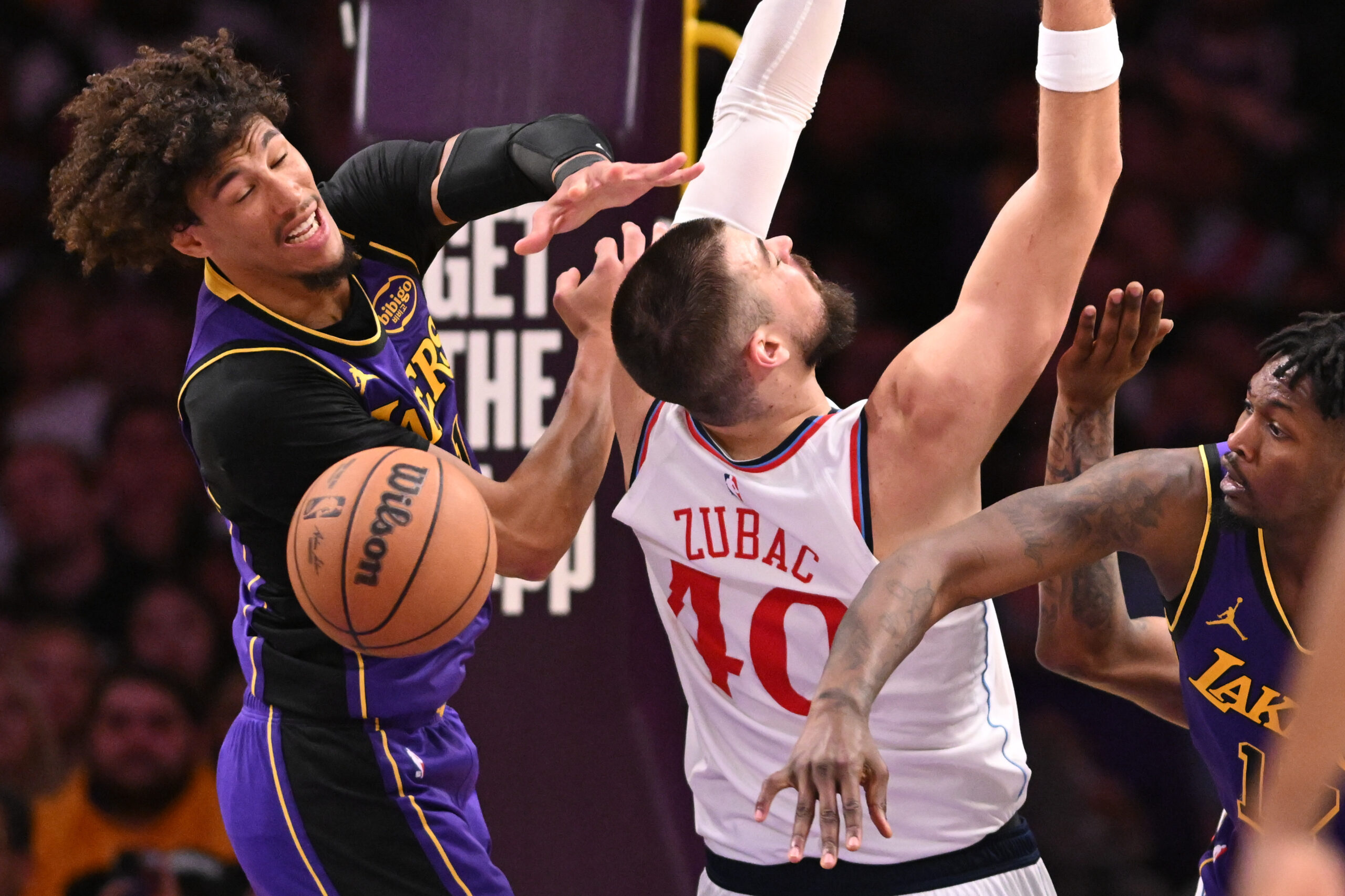 Lakers center Jaxson Hayes, left, and forward Dorian Finney-Smith, right,...