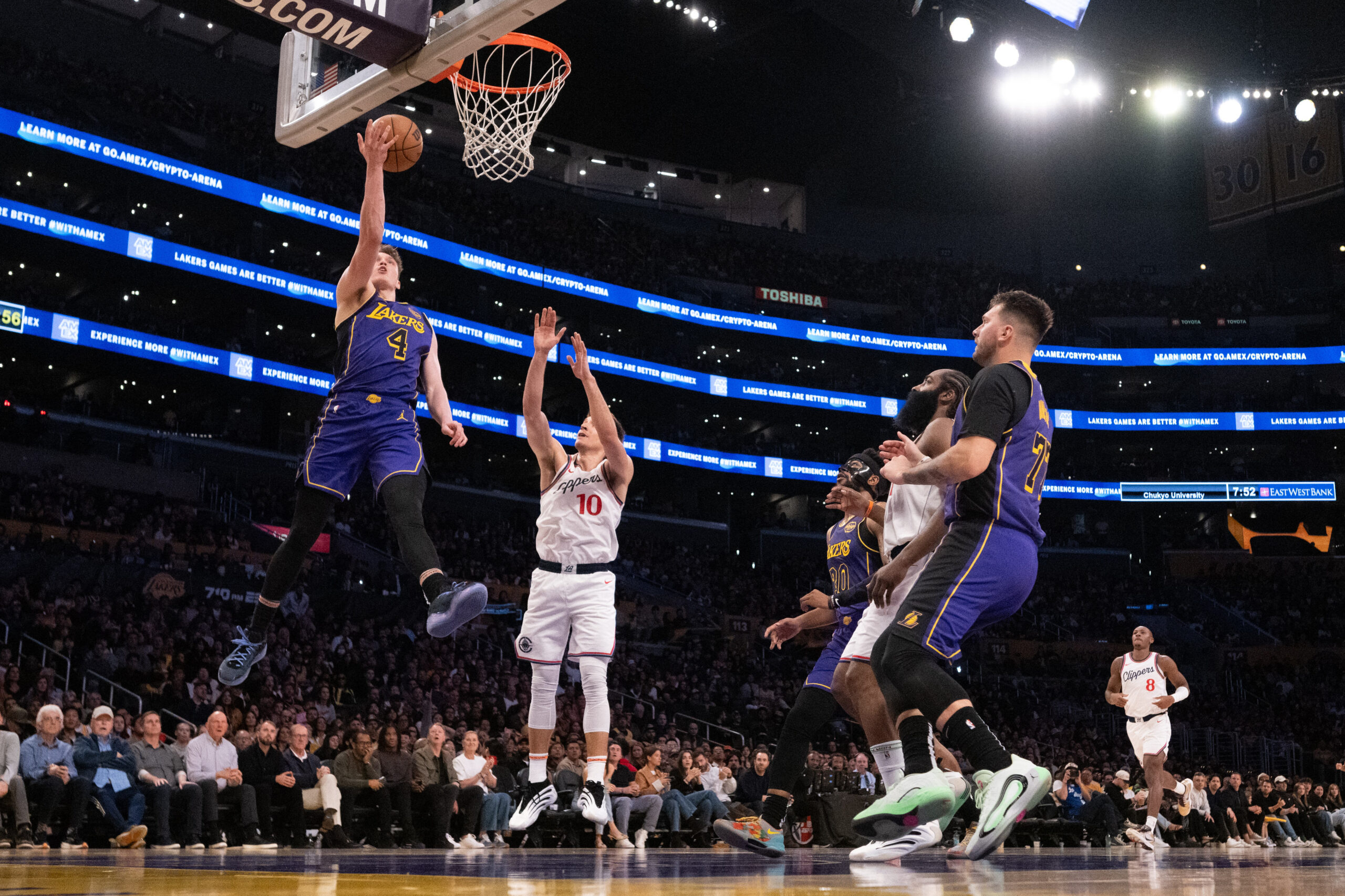 Lakers rookie Dalton Knecht gets to the basket for a...