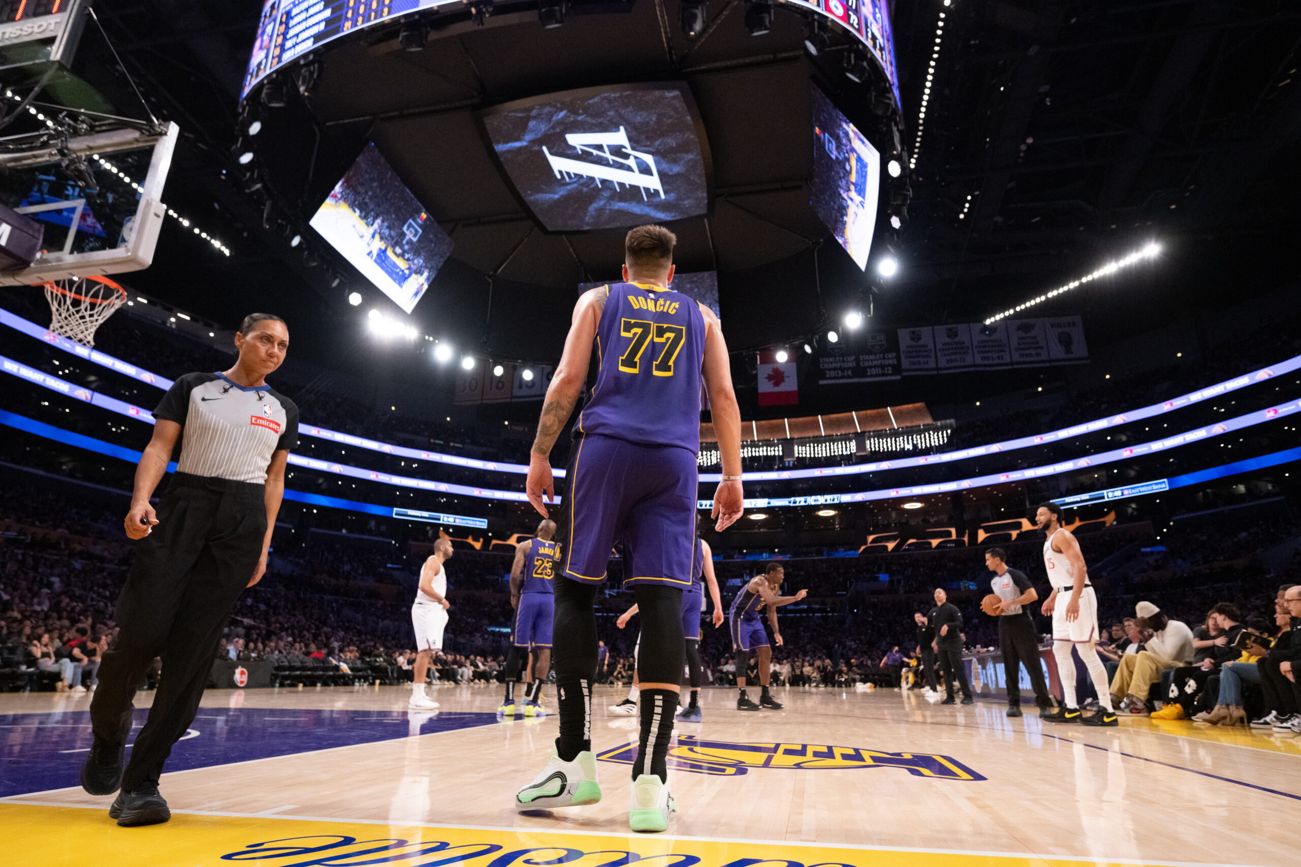 Lakers star Luka Doncic waits for play to resume during...