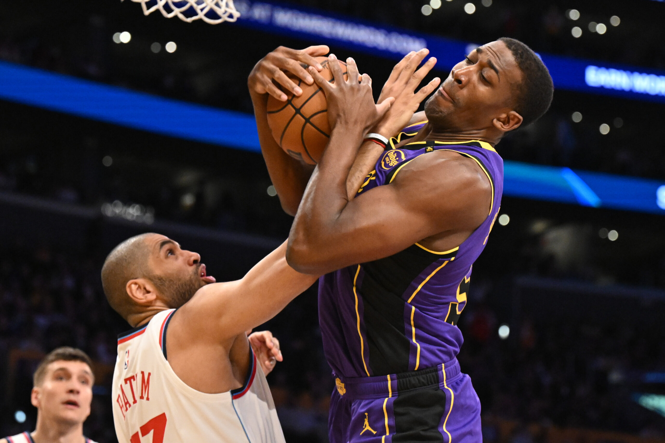 The Lakers’ Trey Jemison, right, and Clippers forward Nicolas Batum...