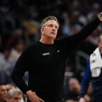 Mar 12, 2025; Denver, Colorado, USA; Minnesota Timberwolves head coach Chris Finch during the second quarter against the Minnesota Timberwolves at Ball Arena. Mandatory Credit: Ron Chenoy-Imagn Images