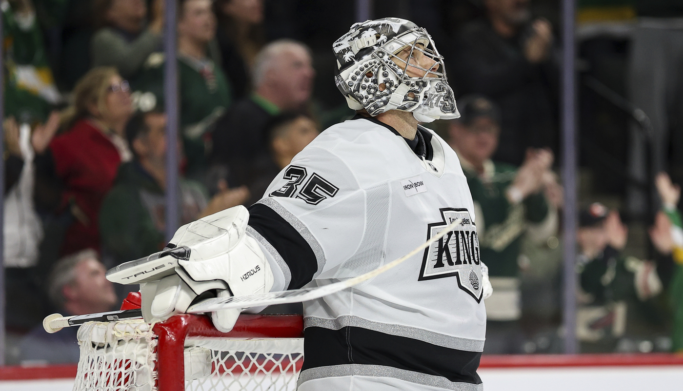 Kings goaltender Darcy Kuemper looks up at the videoboard after...