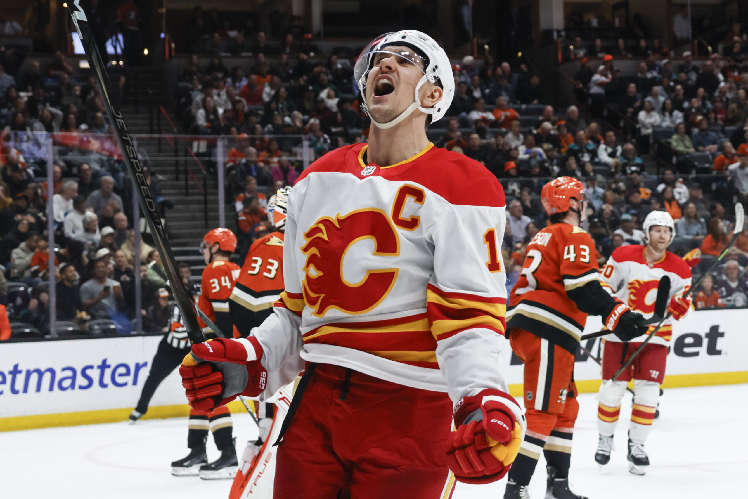 Calgary Flames center Mikael Backlund celebrates after scoring against the...
