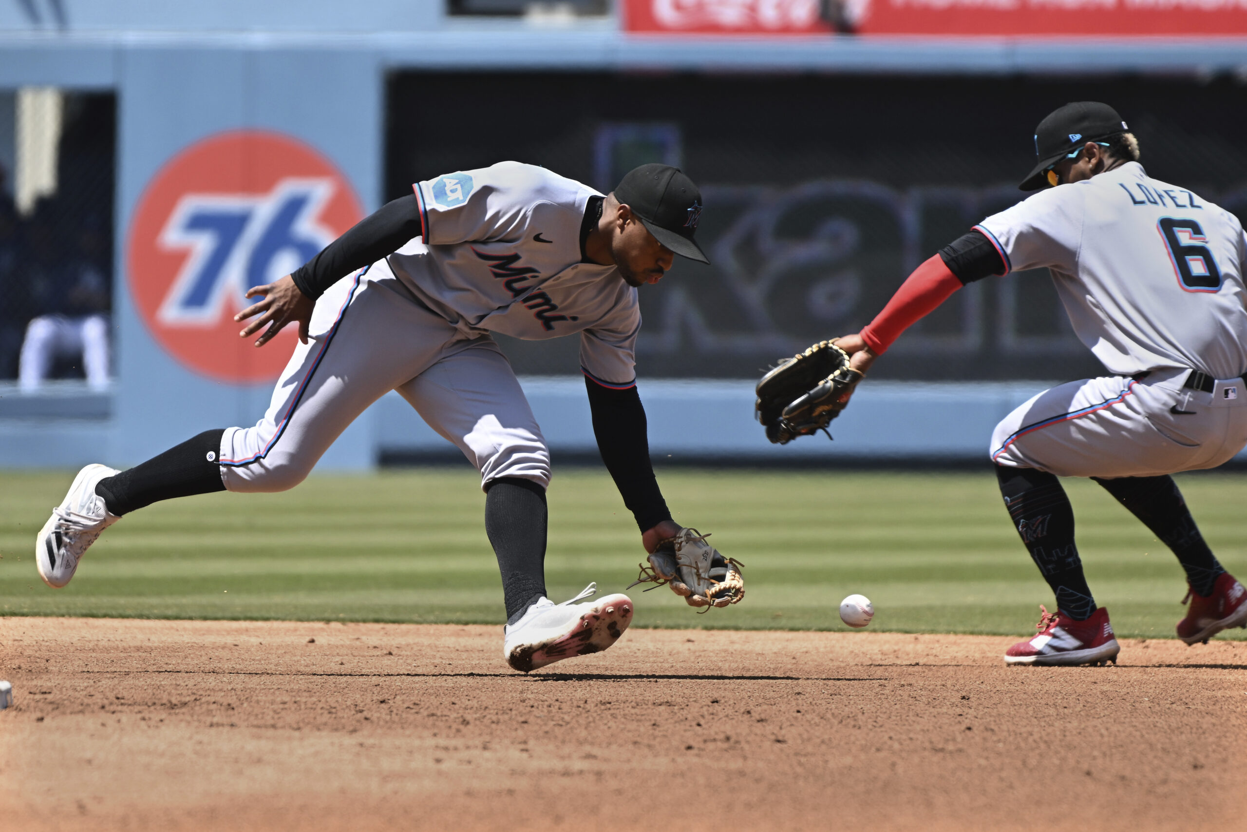 Miami Marlins shortstop Xavier Edwards, left, and second baseman Otto...