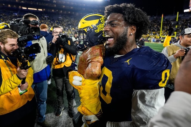 Michigan defensive end Josaiah Stewart (0) celebrates with the Paul Bunyan Trophy after 24-17 win over Michigan State at Michigan Stadium in Ann Arbor on Saturday, Oct. 26, 2024. Josaiah Stewart, Rams