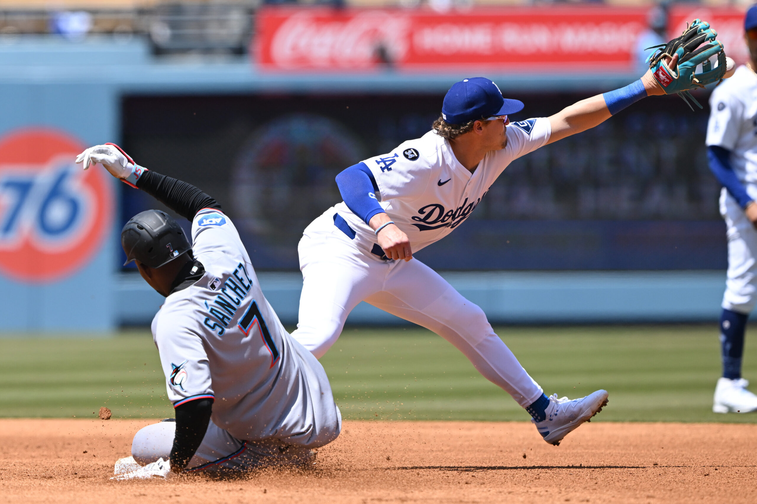The Dodgers’ Kike Hernandez, right, forces out the Miami Marlins’...