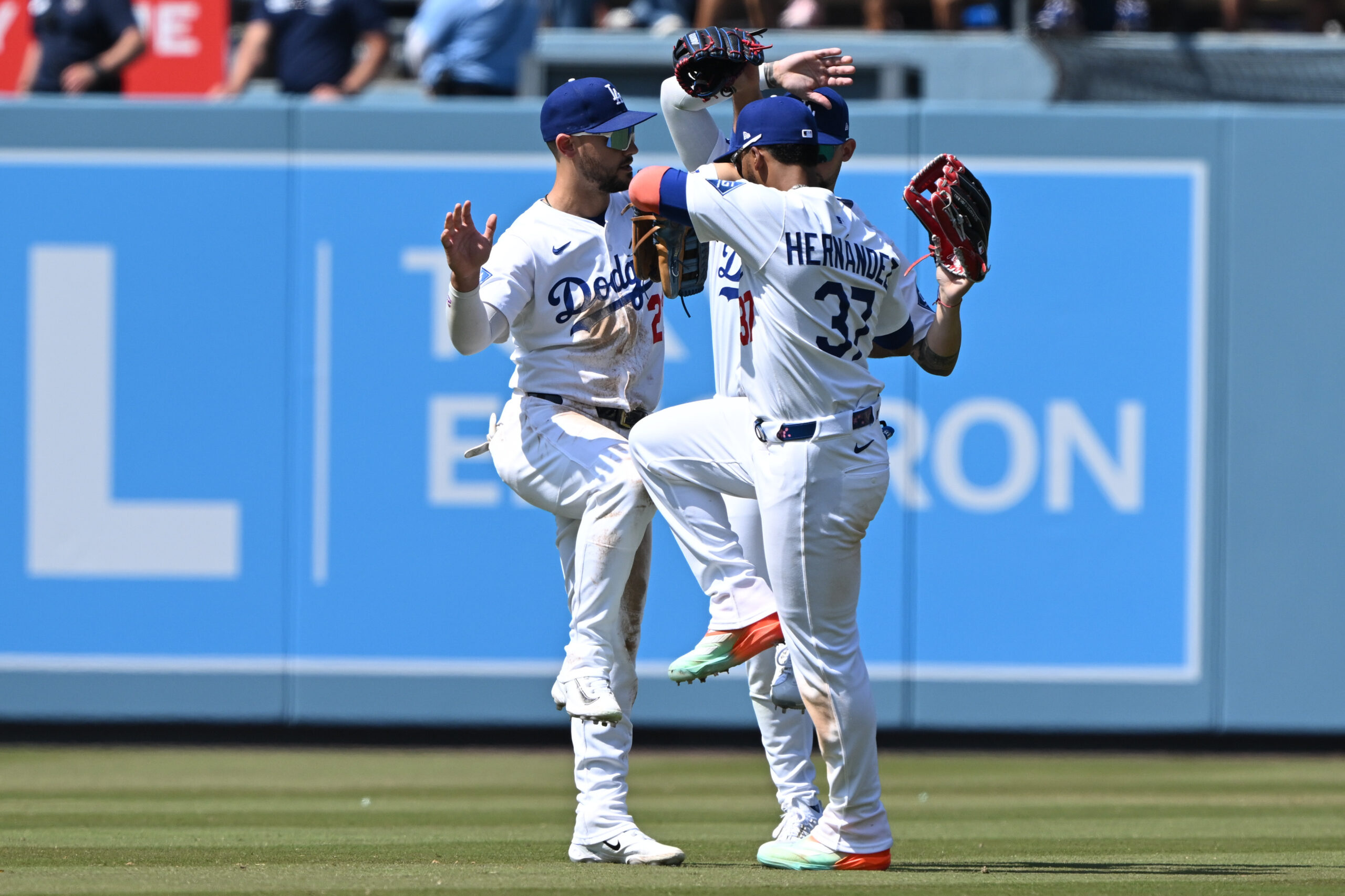 Dodgers outfielders Michael Conforto (23), Andy Pages (44) and Teoscar...