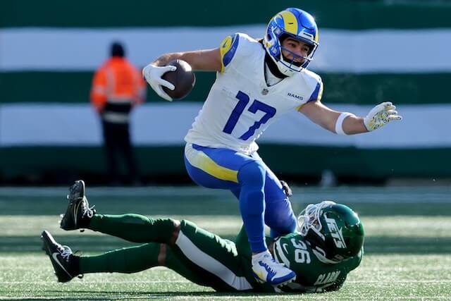 Dec 22, 2024; East Rutherford, New Jersey, USA; New York Jets safety Chuck Clark (36) tackles Los Angeles Rams wide receiver Puka Nacua (17) during the first quarter at MetLife Stadium. Mandatory Credit: Brad Penner-Imagn Images Puka Nacua, Rams