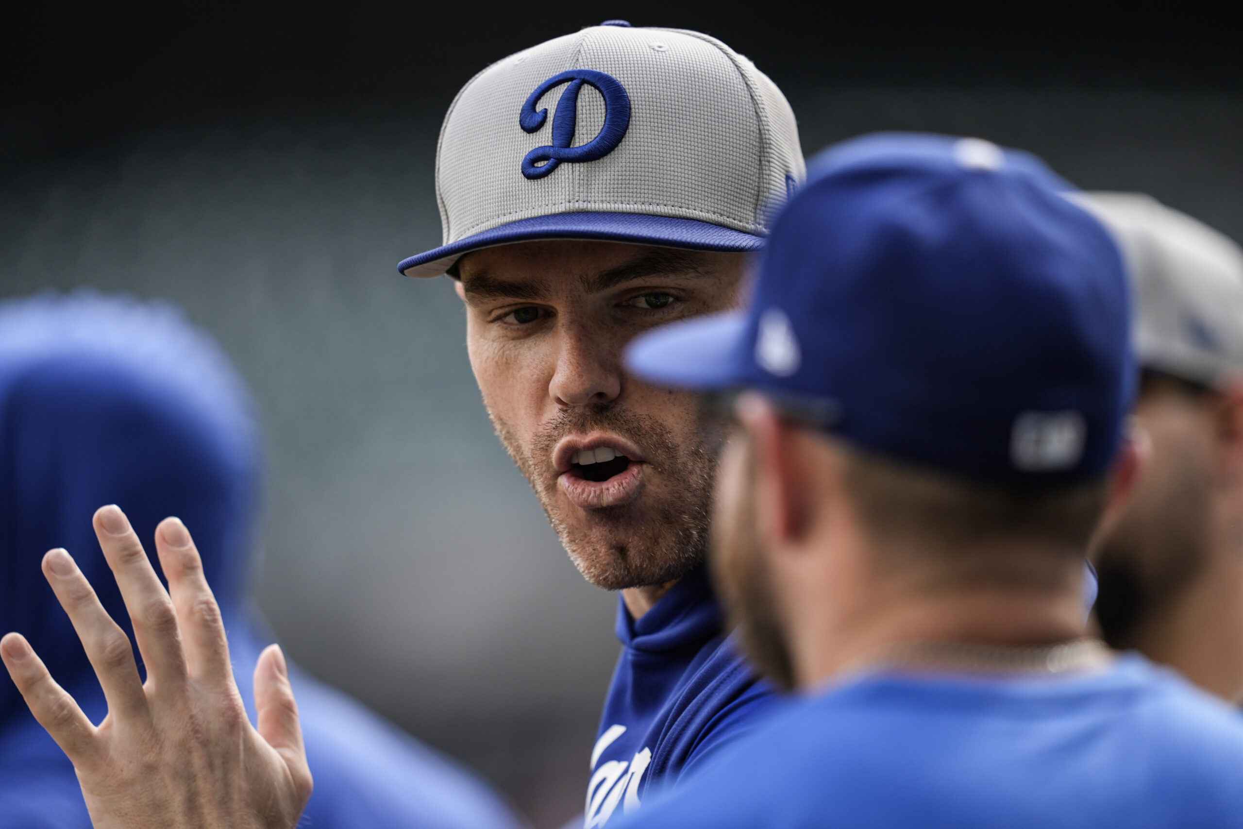 Dodgers first baseman Freddie Freeman warms up before game against...