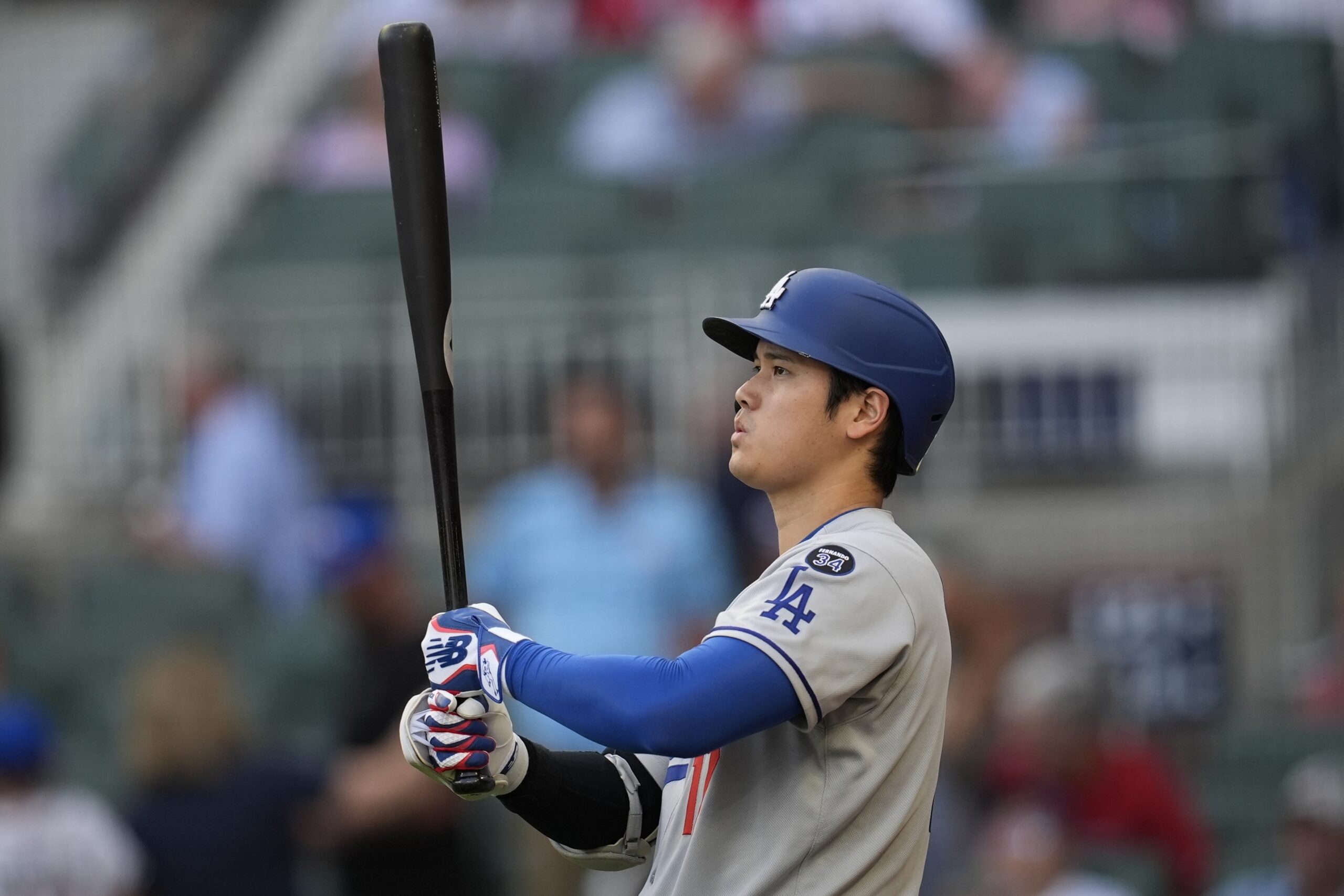 Dodgers star Shohei Ohtani prepares to bat against the Atlanta...