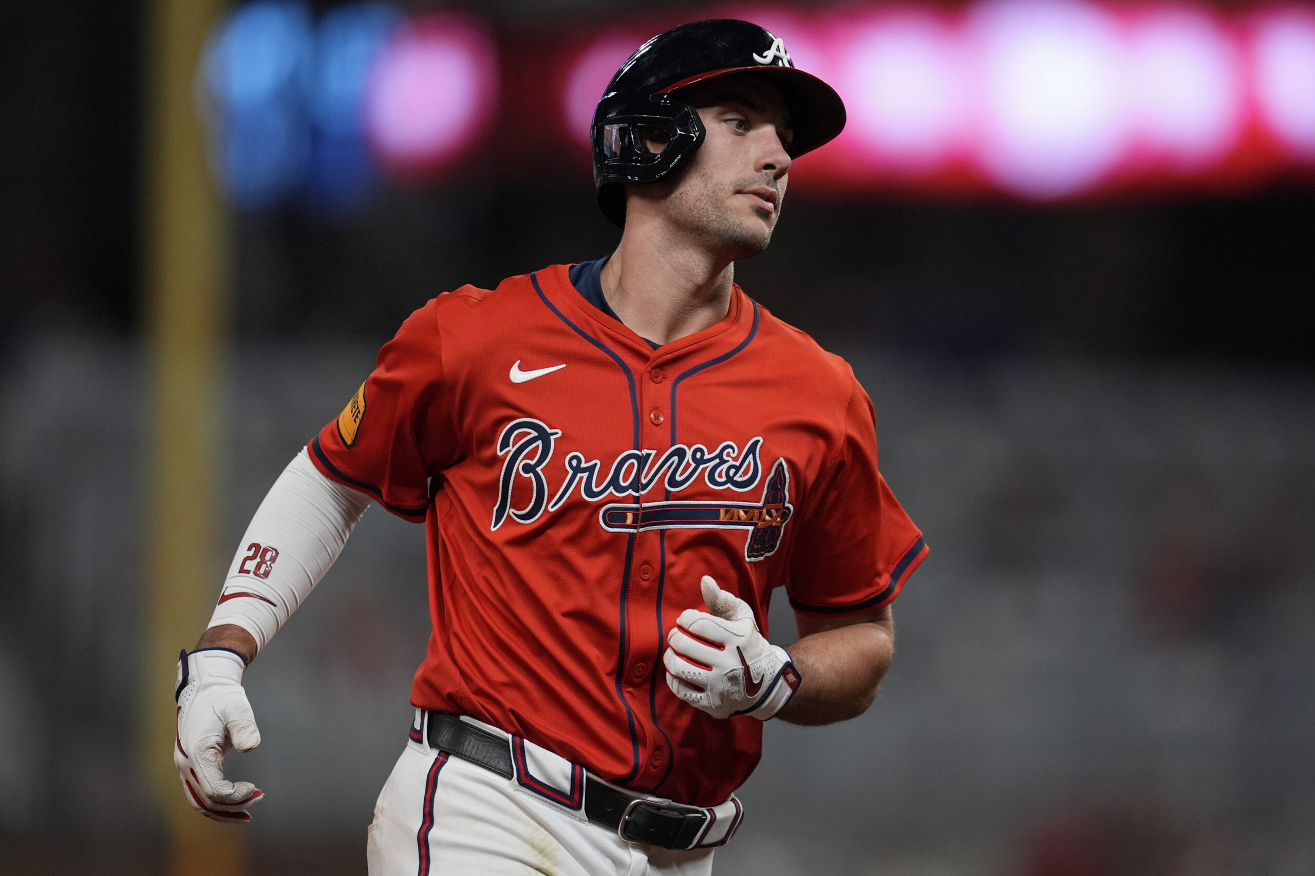 The Atlanta Braves’ Matt Olson rounds the bases after hitting...
