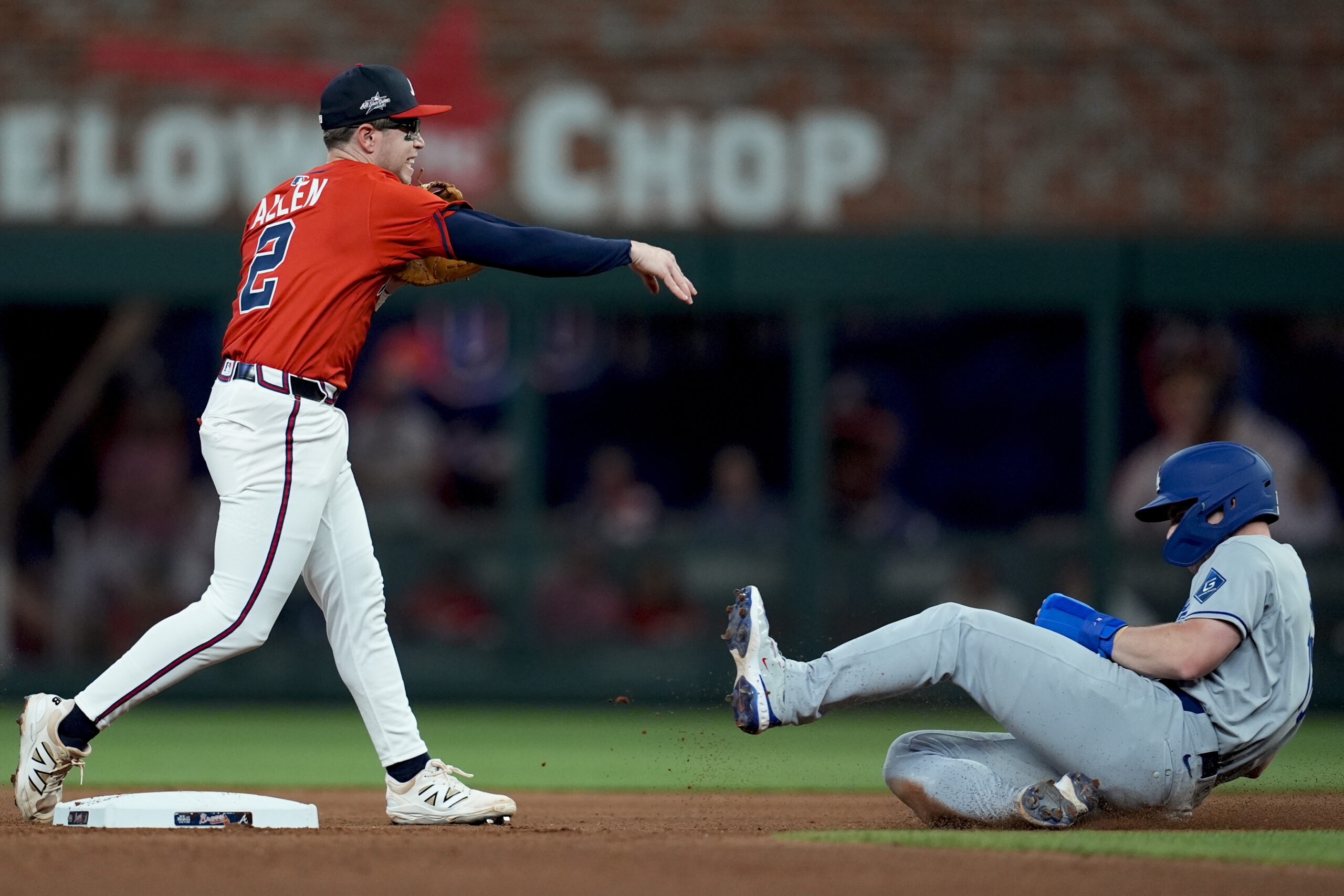 Atlanta Braves shortstop Nick Allen throws to first base after...