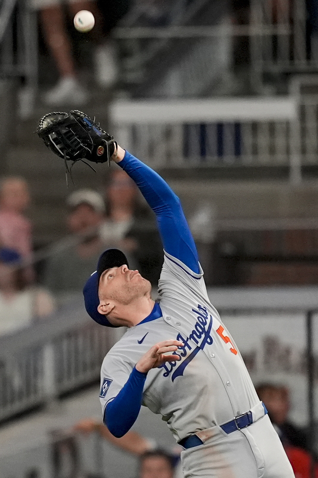 Dodgers first baseman Freddie Freeman makes the catch against Atlanta...