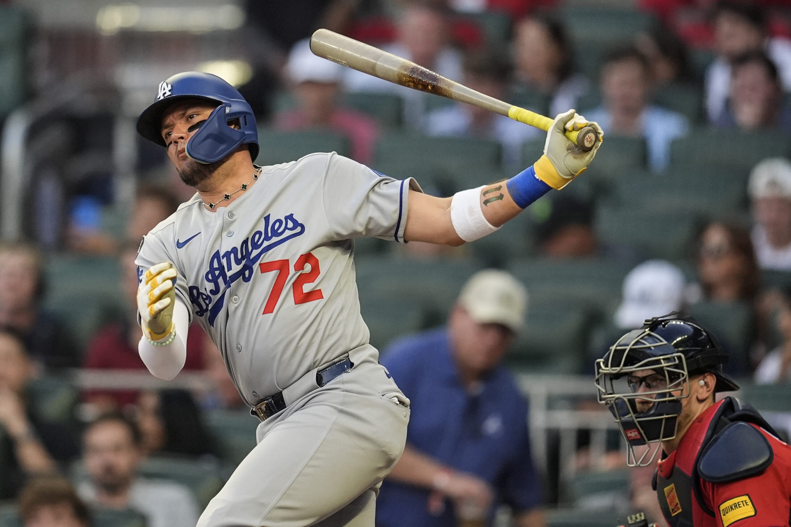 The Dodgers’ Miguel Rojas strikes out against the Atlanta Braves...