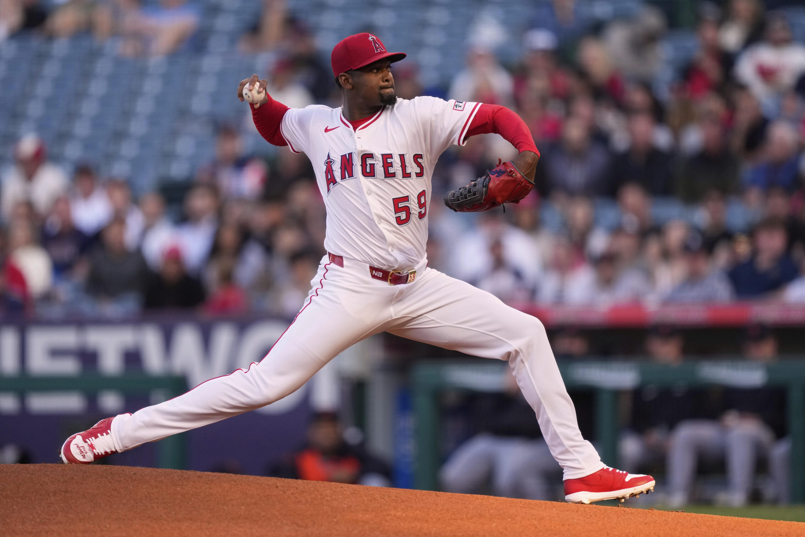 Angels starting pitcher Jose Soriano throws to the plate during...