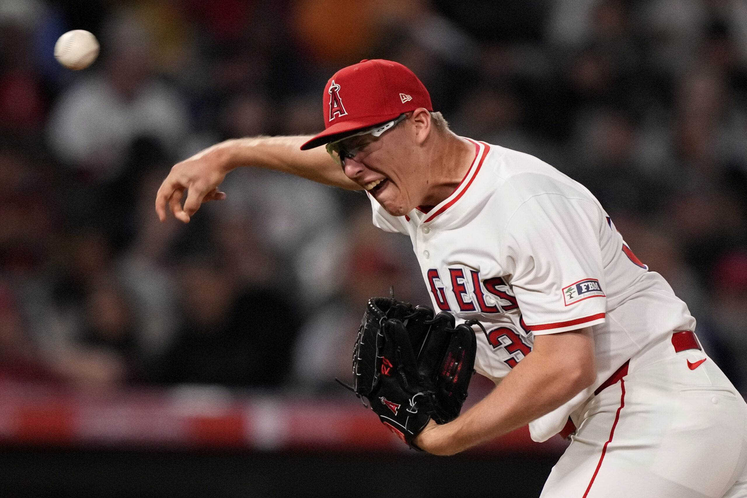 Angels relief pitcher Ryan Johnson throws to the plate during...