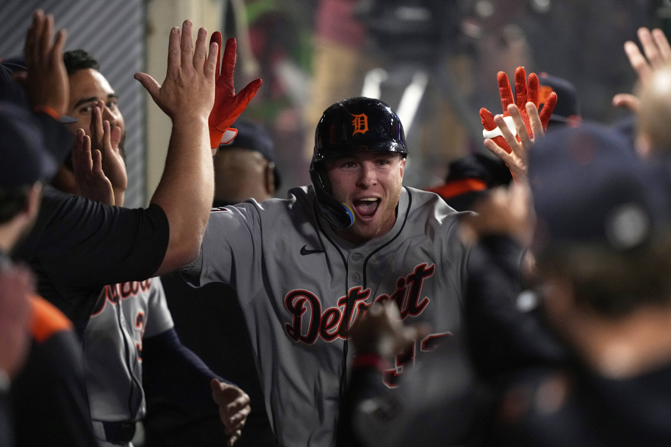 The Detroit Tigers’ Colt Keith is congratulated by teammates in...