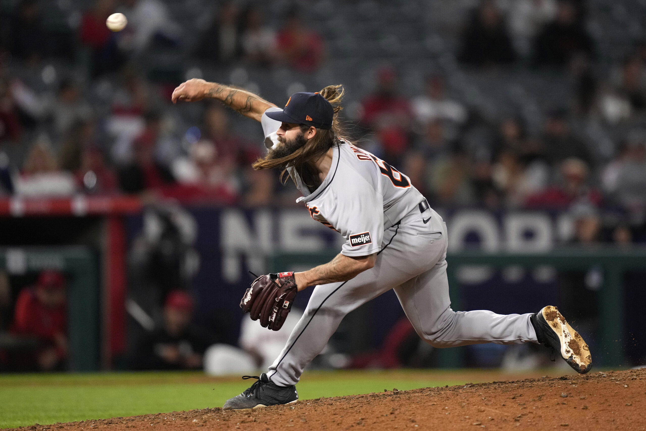 Detroit Tigers relief pitcher Tyler Owens throws to the plate...