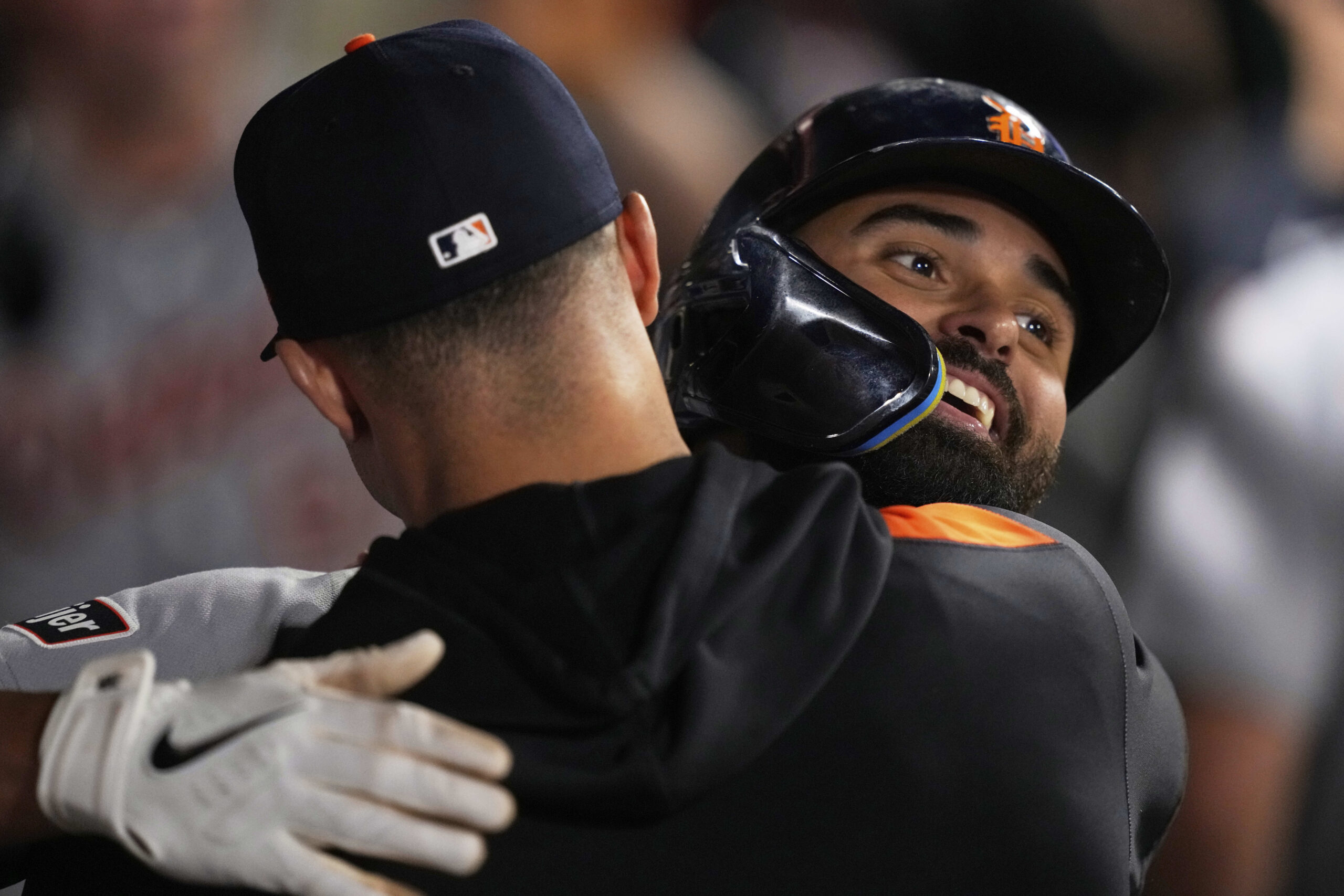 The Detroit Tigers’ Riley Greene is congratulated by a teammate...