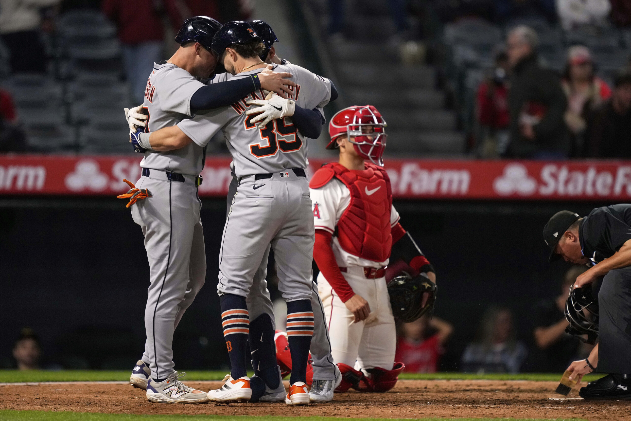 The Detroit Tigers’ Riley Greene, center, is congratulated by Spencer...