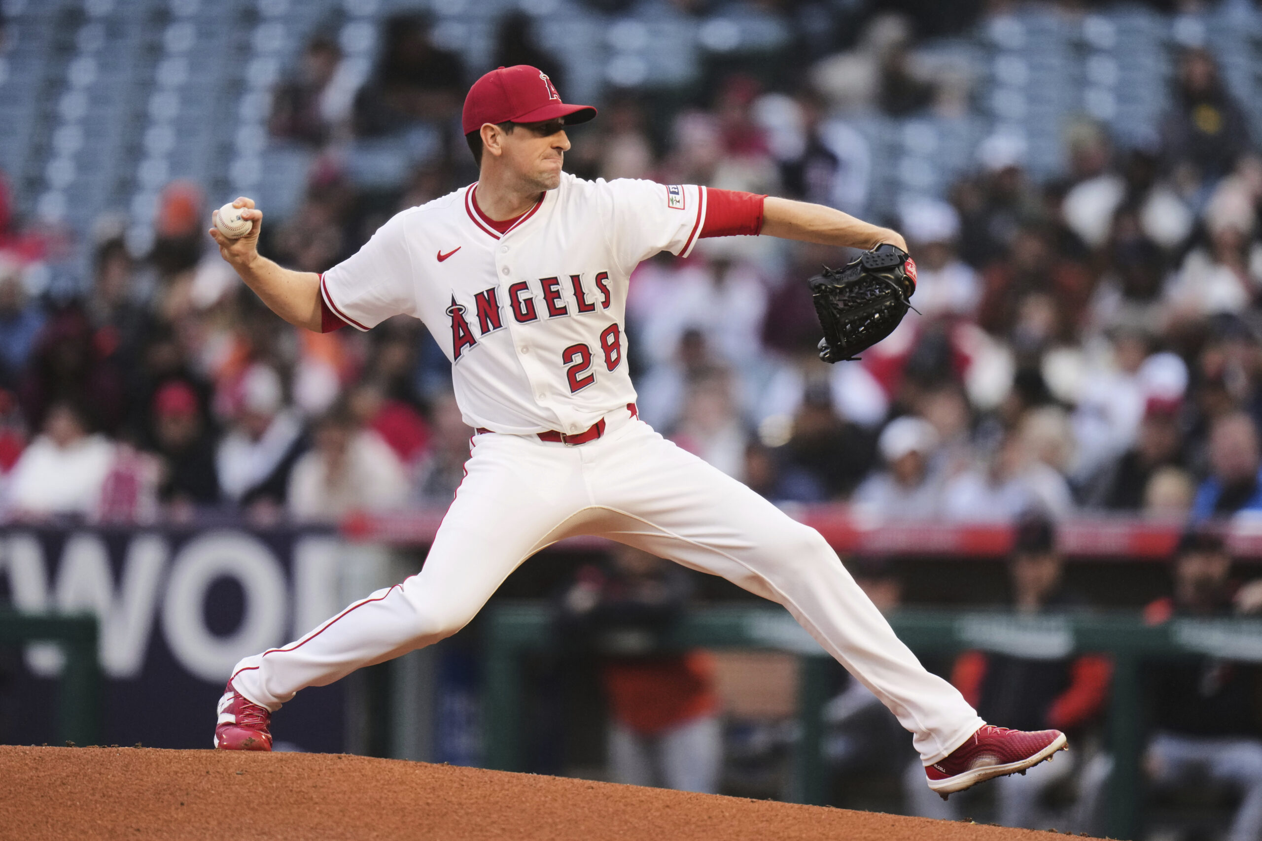 Angels starting pitcher Kyle Hendricks throws to the plate against...