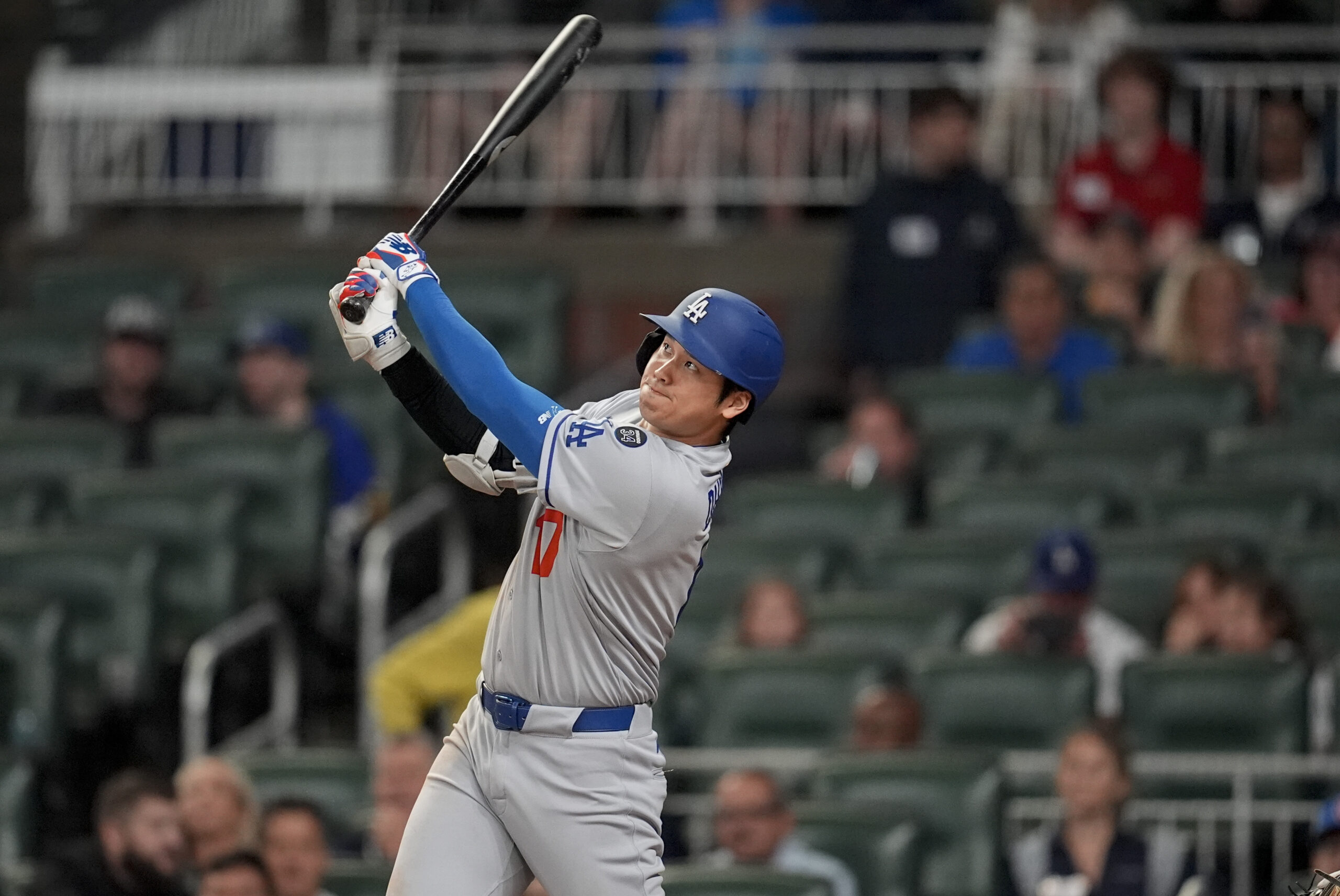 Dodgers star Shohei Ohtani hits a solo homer against the...