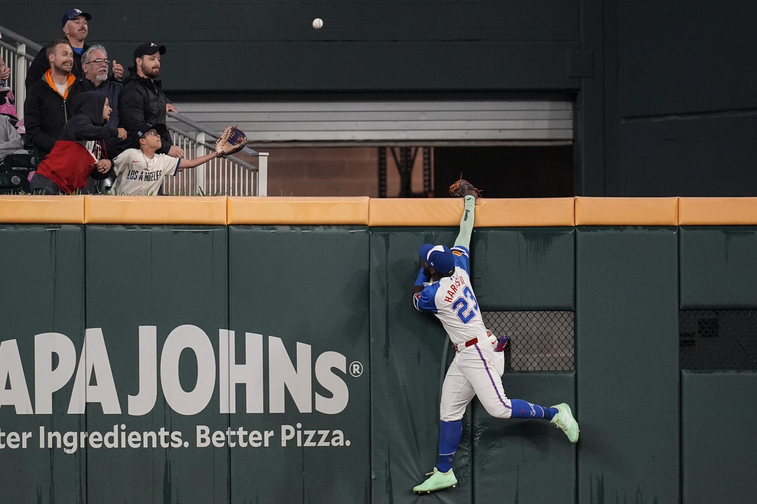 Atlanta Braves outfielder Michael Harris II watches as a ball...