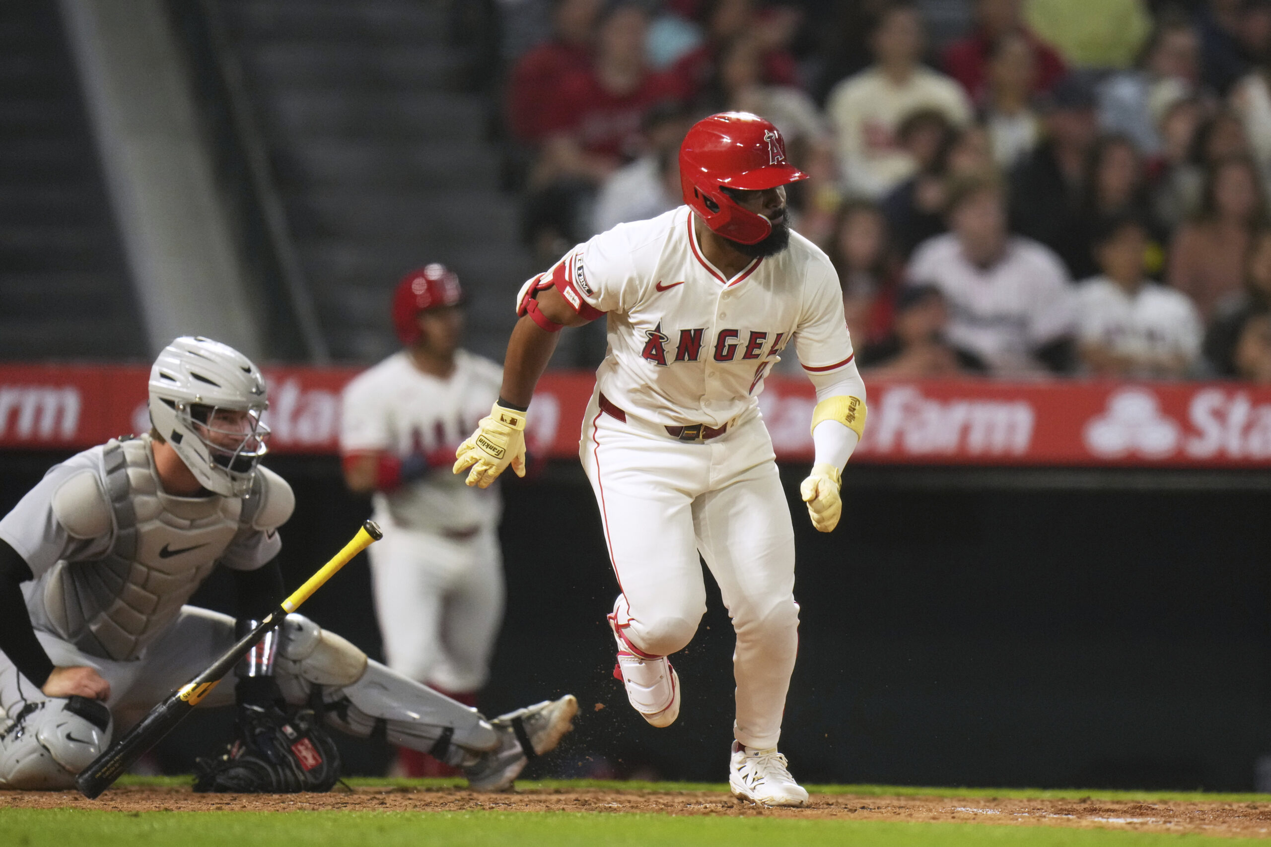 The Angels’ Luis Rengifo watches after hitting a two-run single...