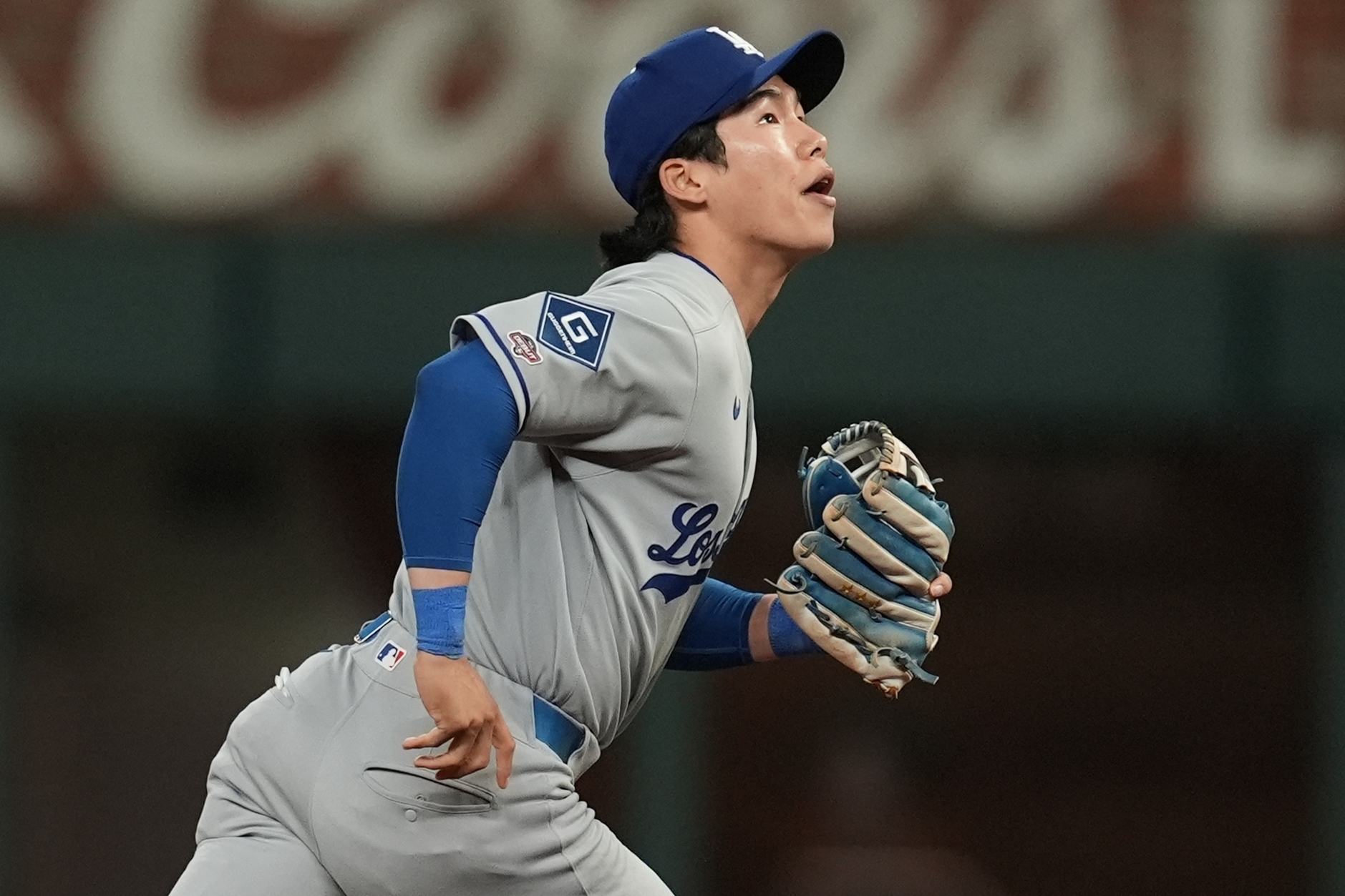 Dodgers second baseman Hyeseong Kim takes the field for his...