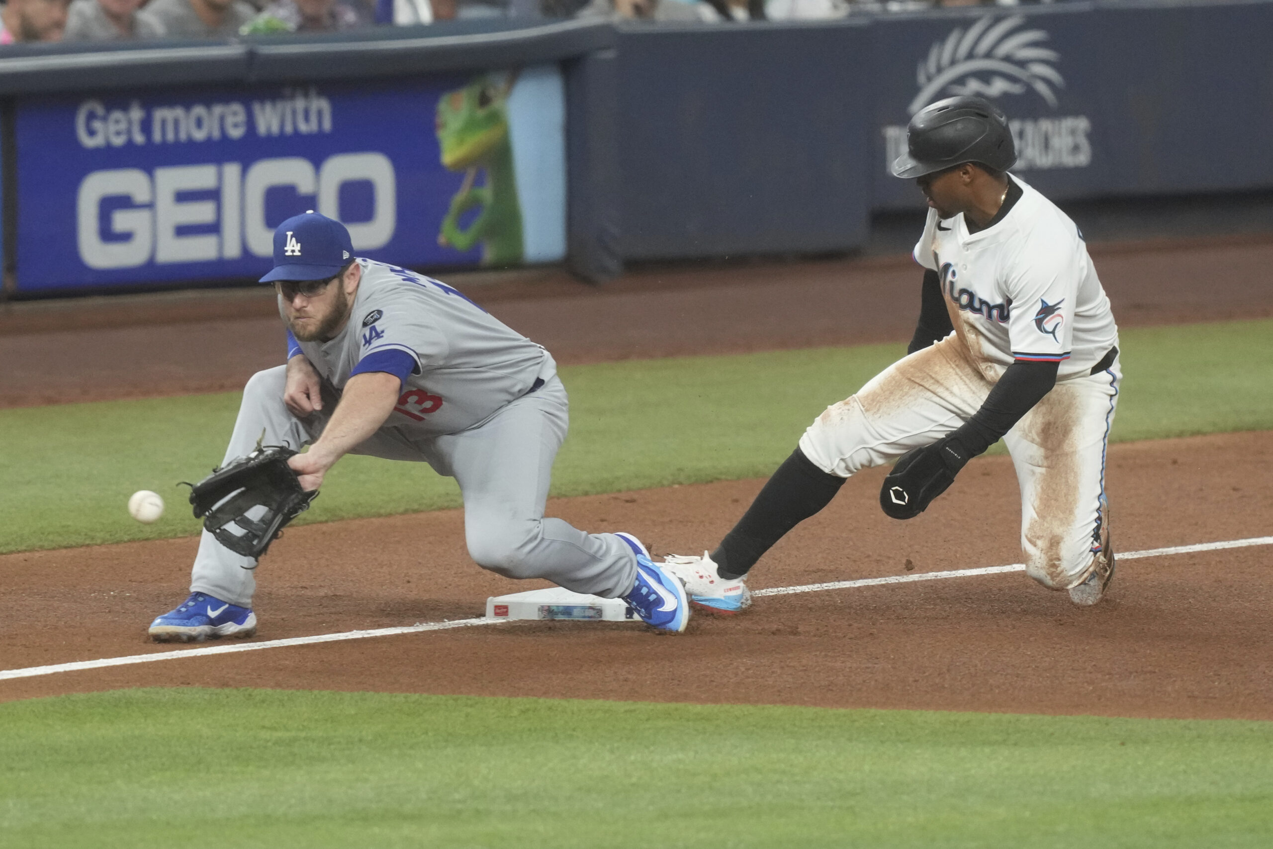 The Miami Marlins’ Xavier Edwards is safe on third base...