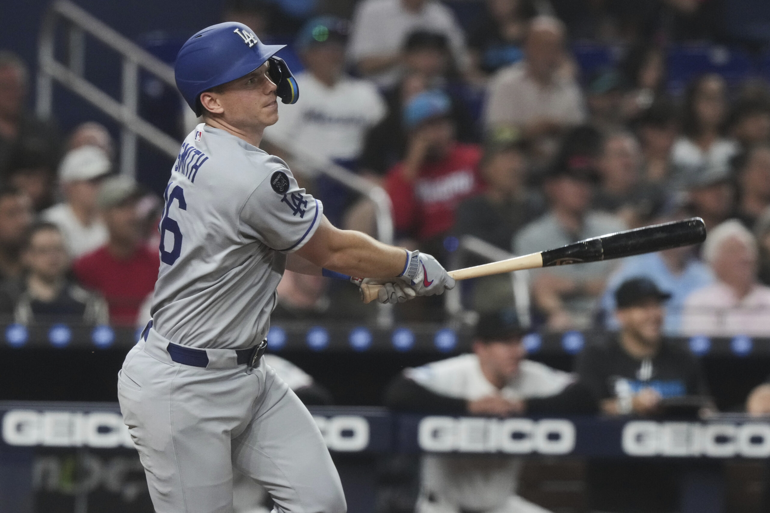 The Dodgers’ Will Smith hits a double during the sixth...