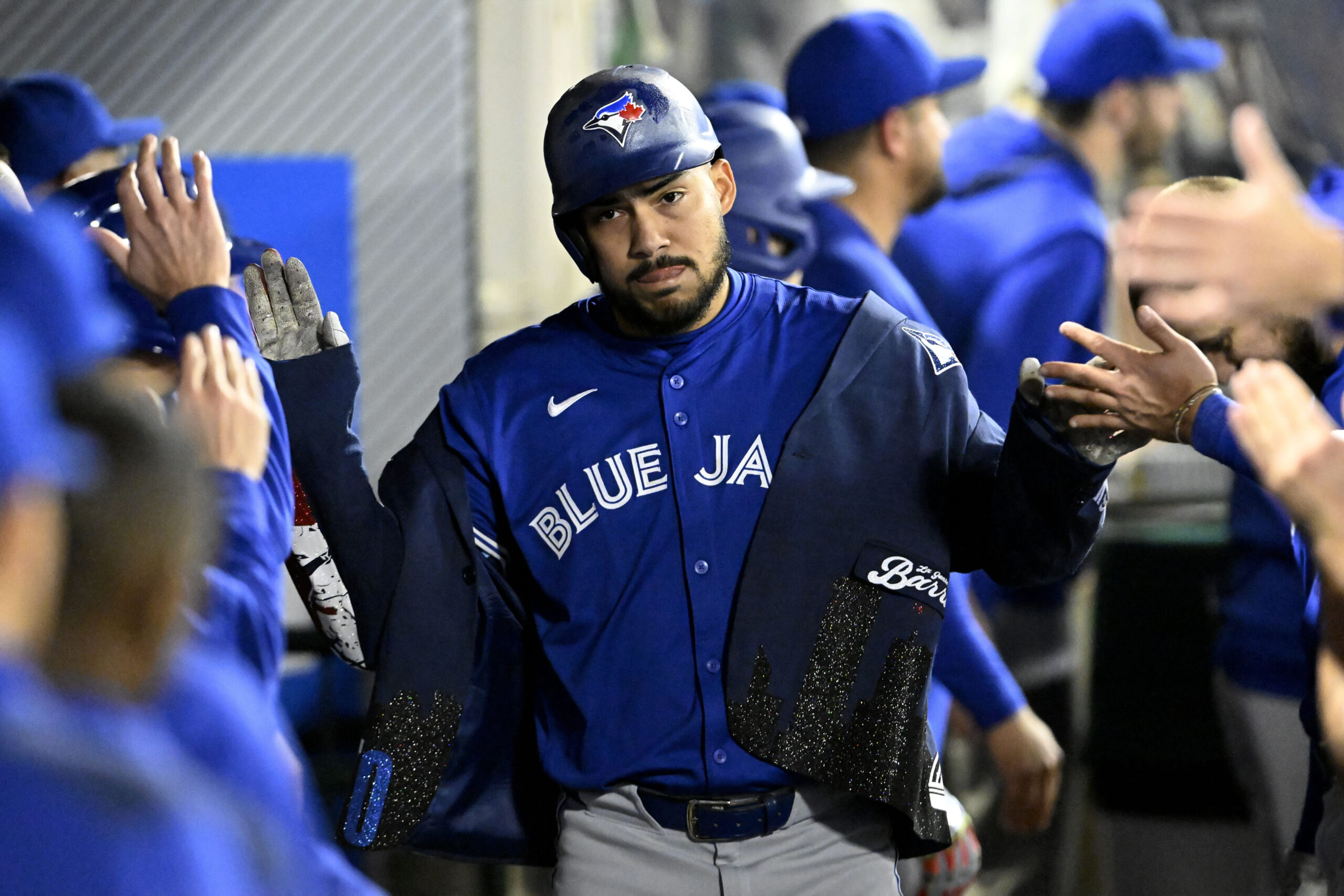 The Toronto Blue Jays’ Anthony Santander celebrates in the dugout...