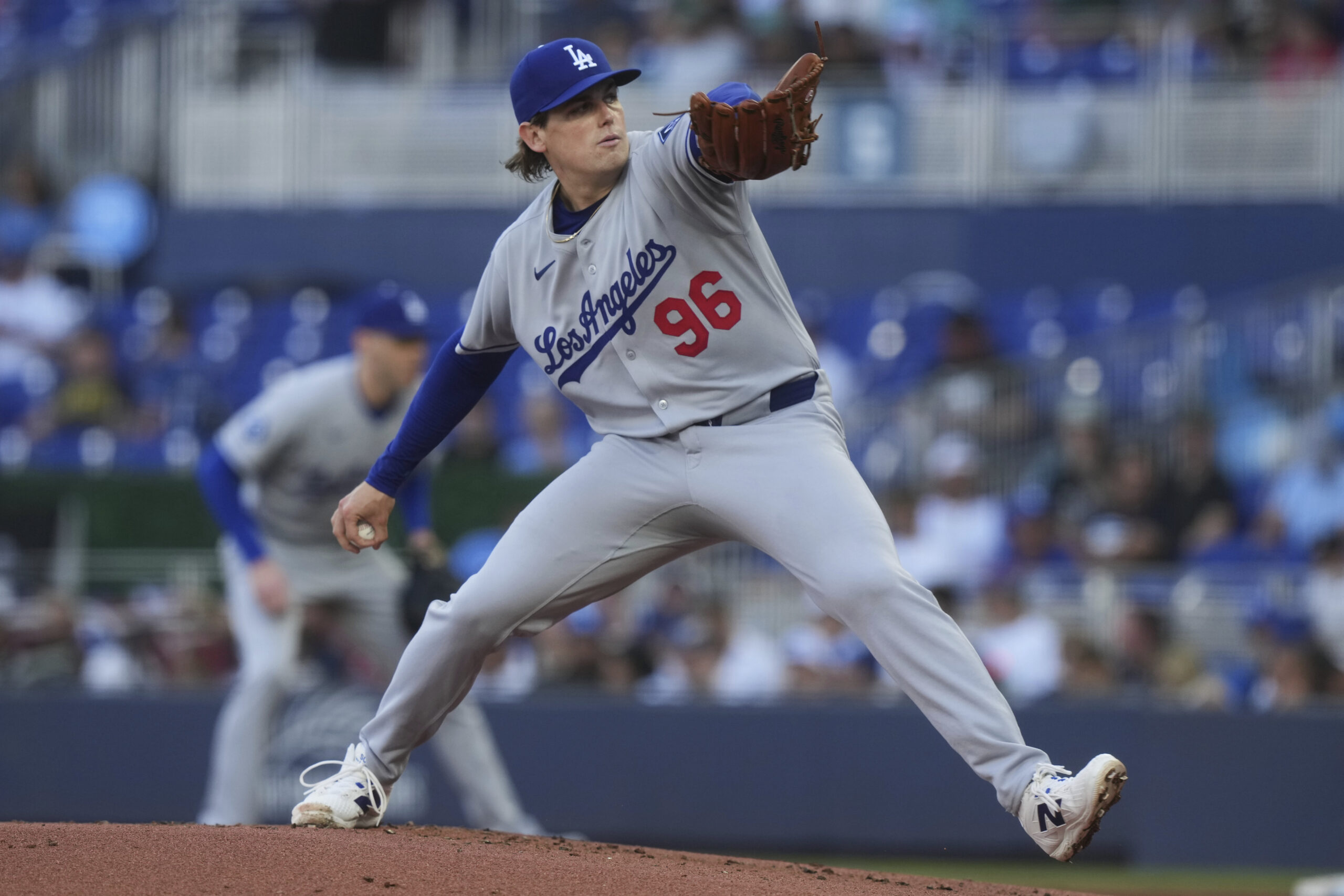 Dodgers starting pitcher Landon Knack throws to the plate during...