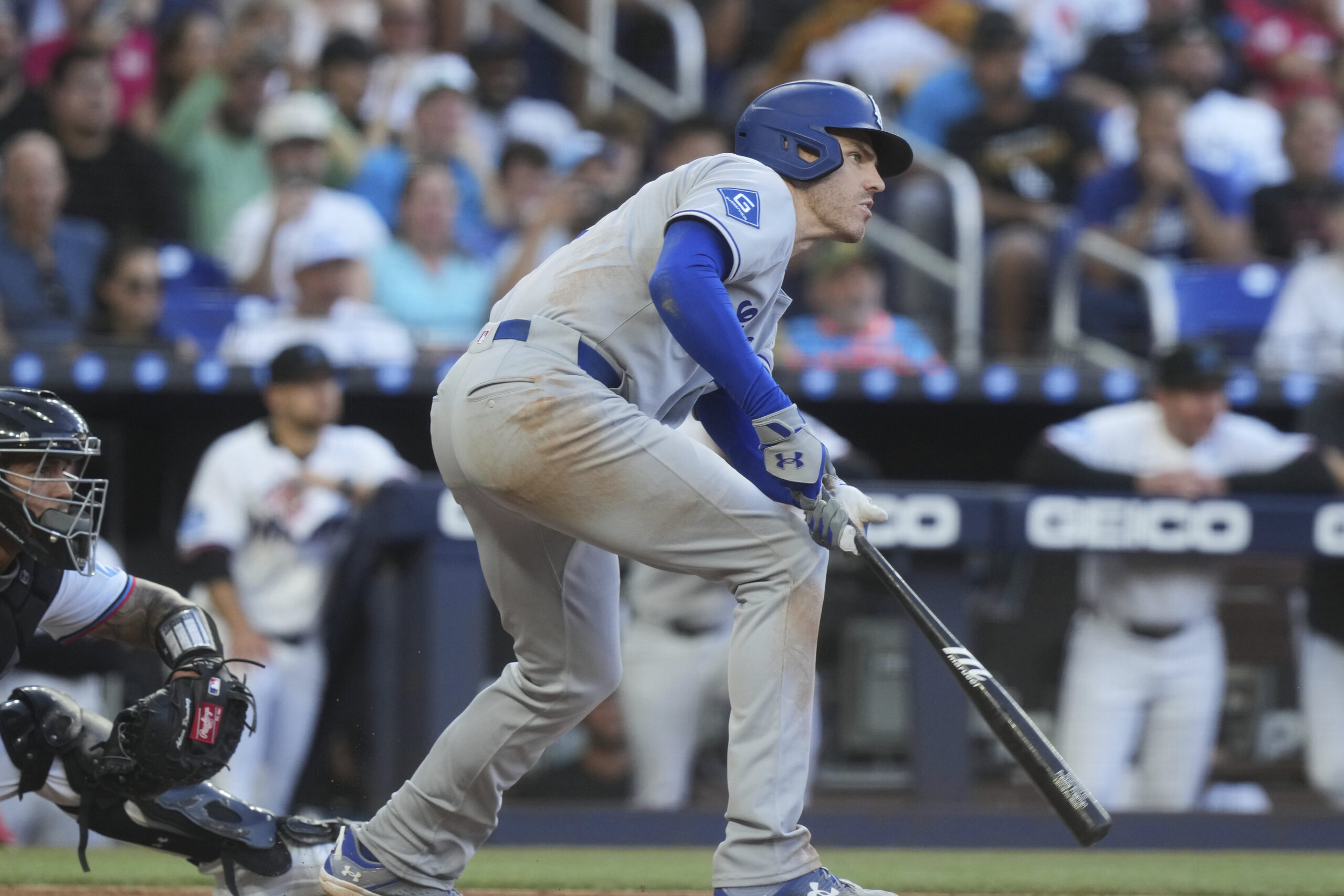 The Dodgers’ Freddie Freeman hits a three-run triple during the...