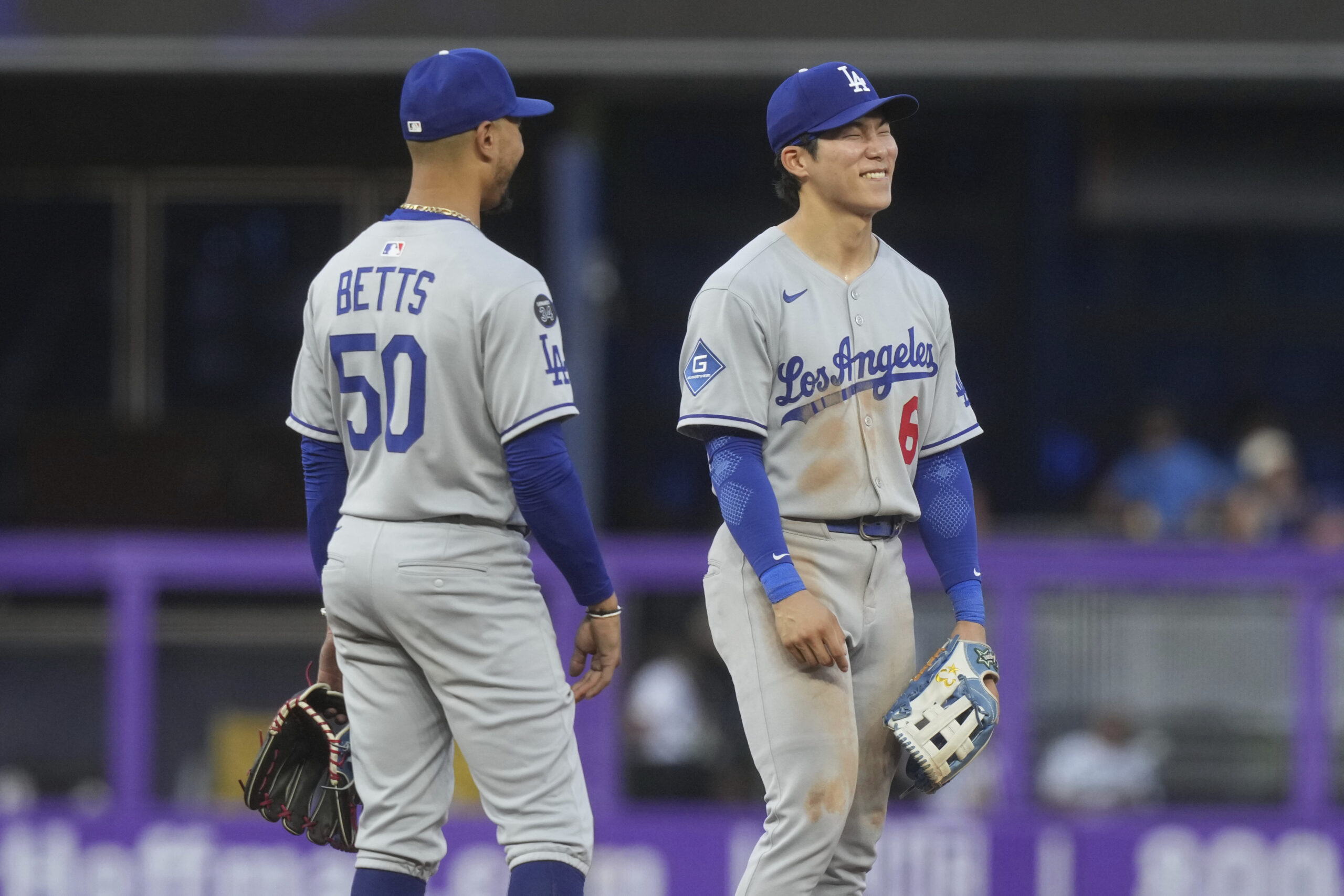 Dodgers shortstop Mookie Betts, left, and second baseman Hyeseong Kim...