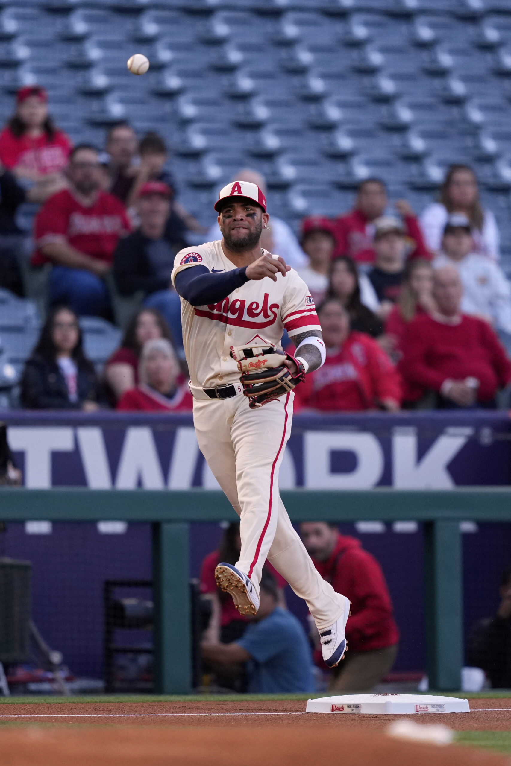 Angels third baseman Yoan Moncada throws out the Toronto Blue...