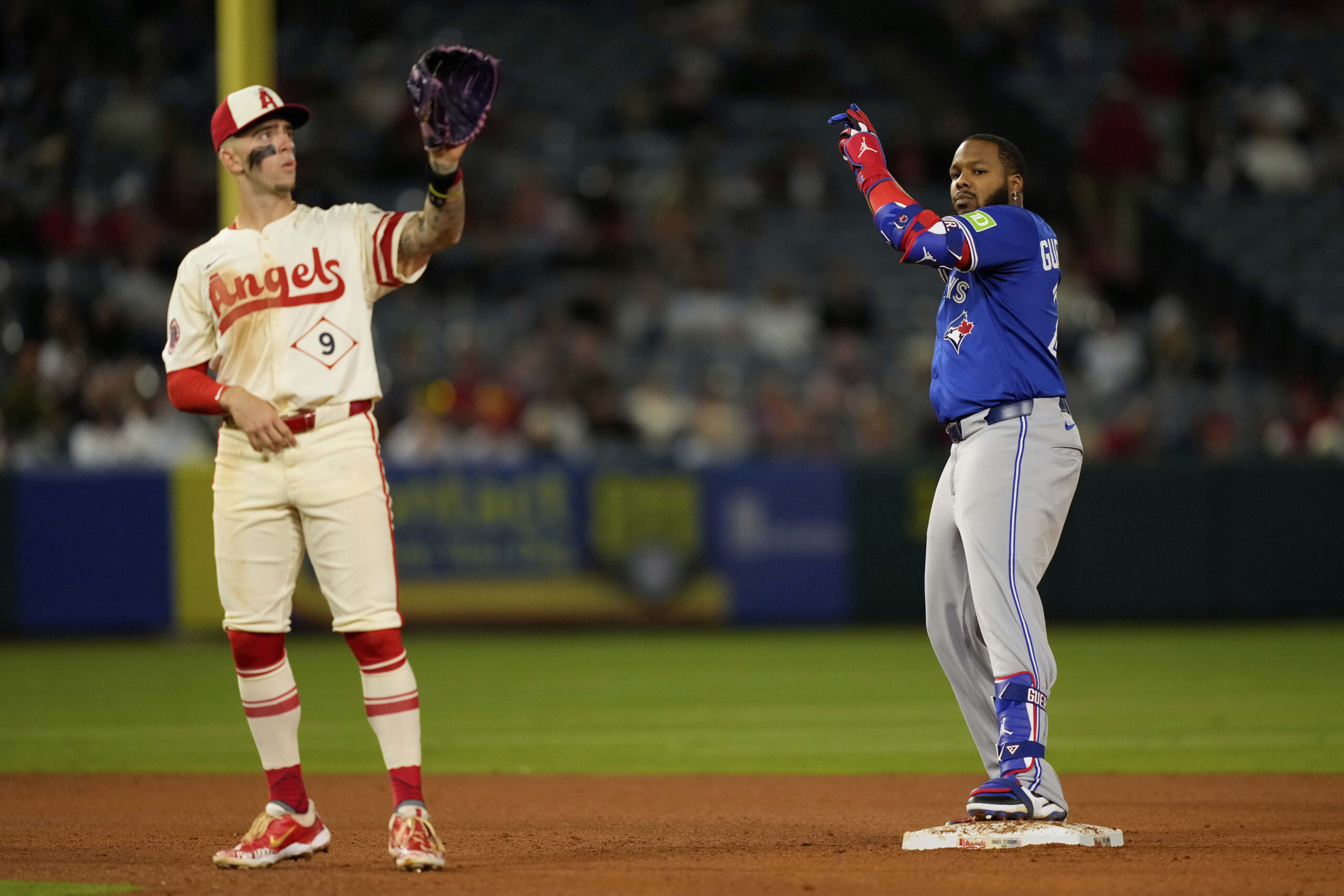 The Toronto Blue Jays’ Vladimir Guerrero Jr., right, gestures after...