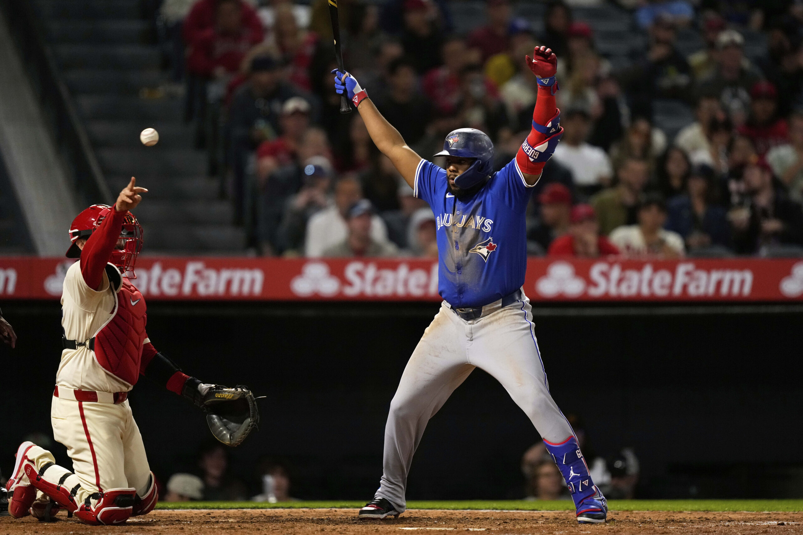 The Toronto Blue Jays’ Vladimir Guerrero Jr., right, gestures after...