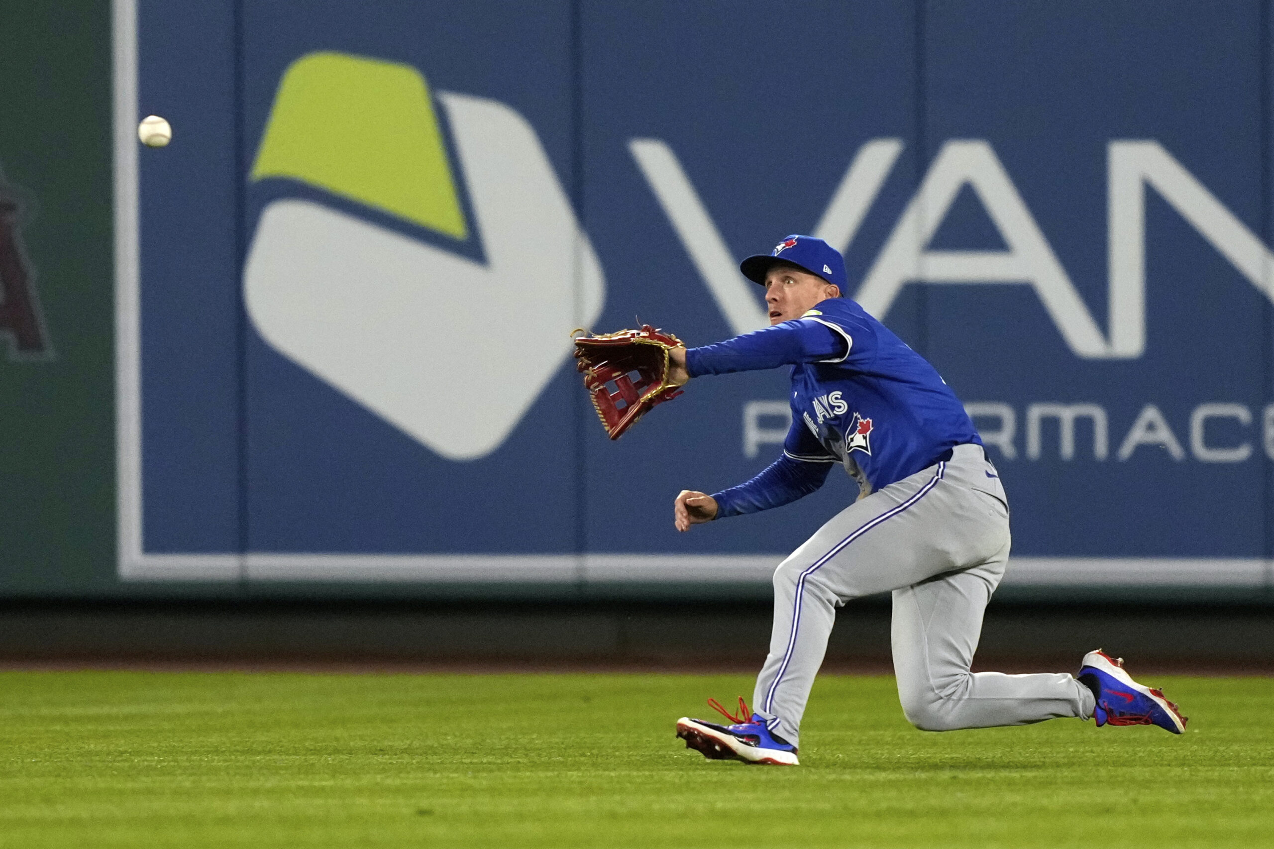 Toronto Blue Jays center fielder Myles Straw makes a catch...